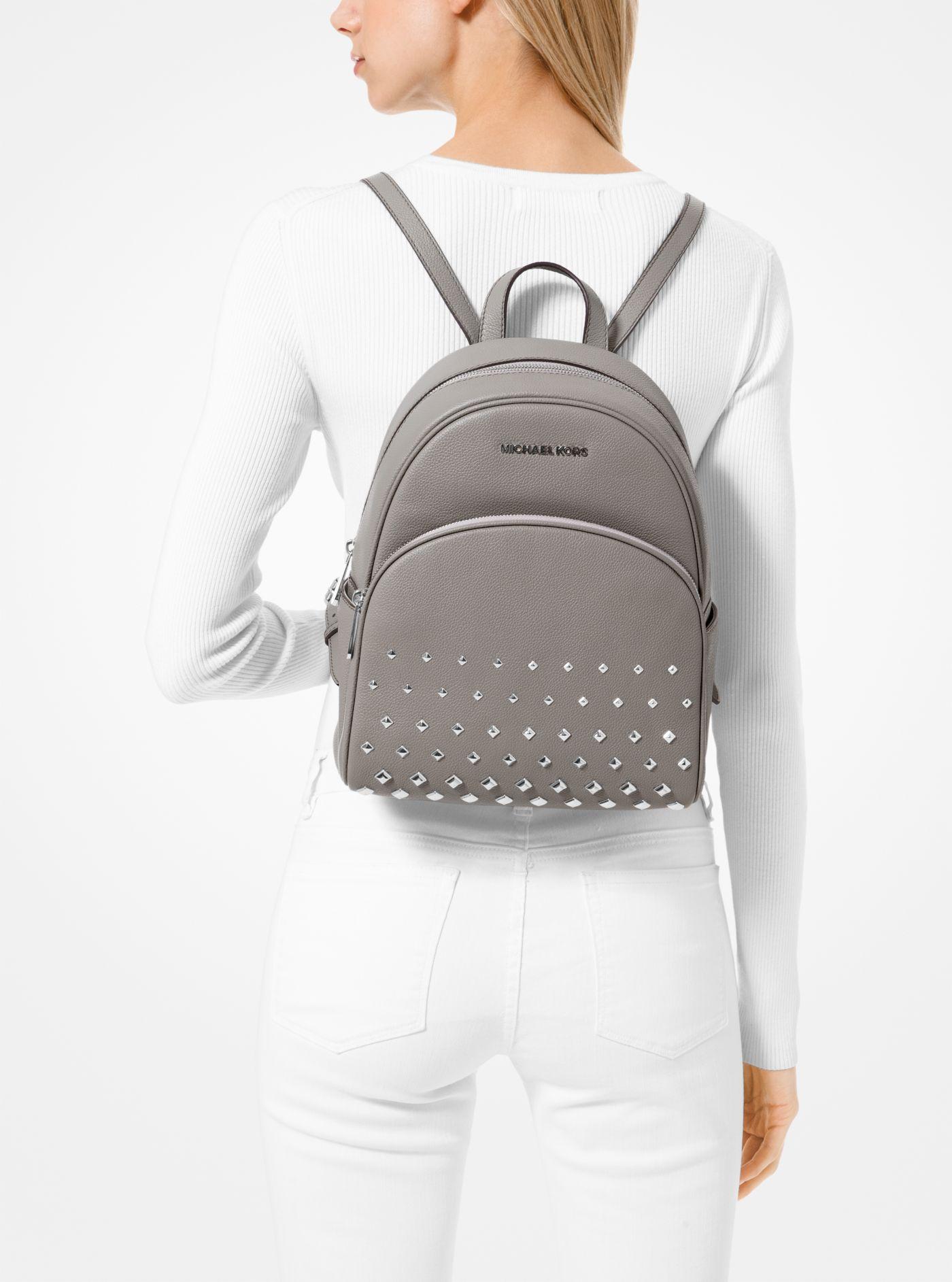 Michael Kors Abbey Backpack Bag Studded Pebbled Leather in Pearl Grey  (Gray) - Lyst