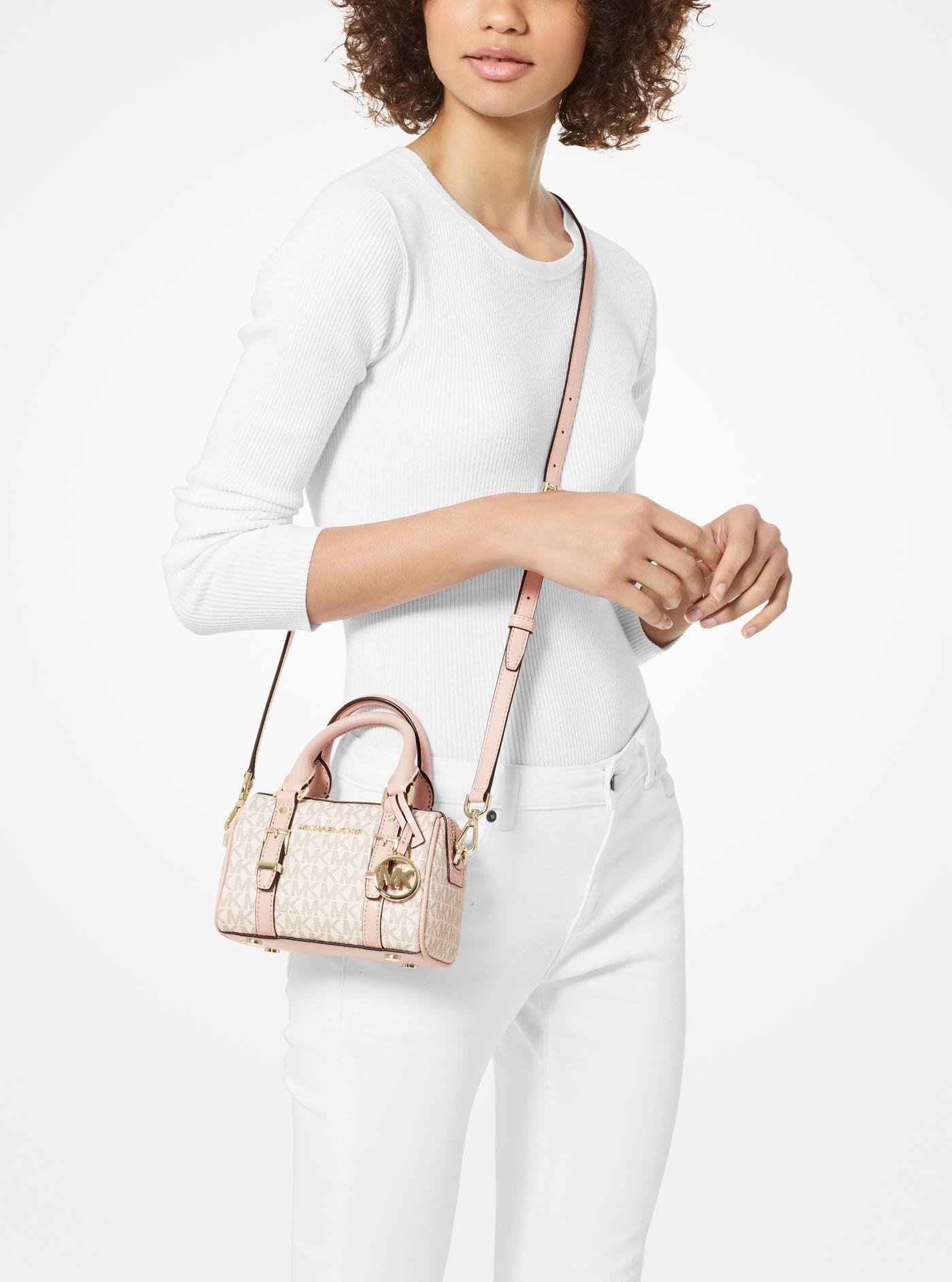 Michael Kors Bedford Legacy Extra-small Logo Duffle Crossbody Bag in Pink |  Lyst