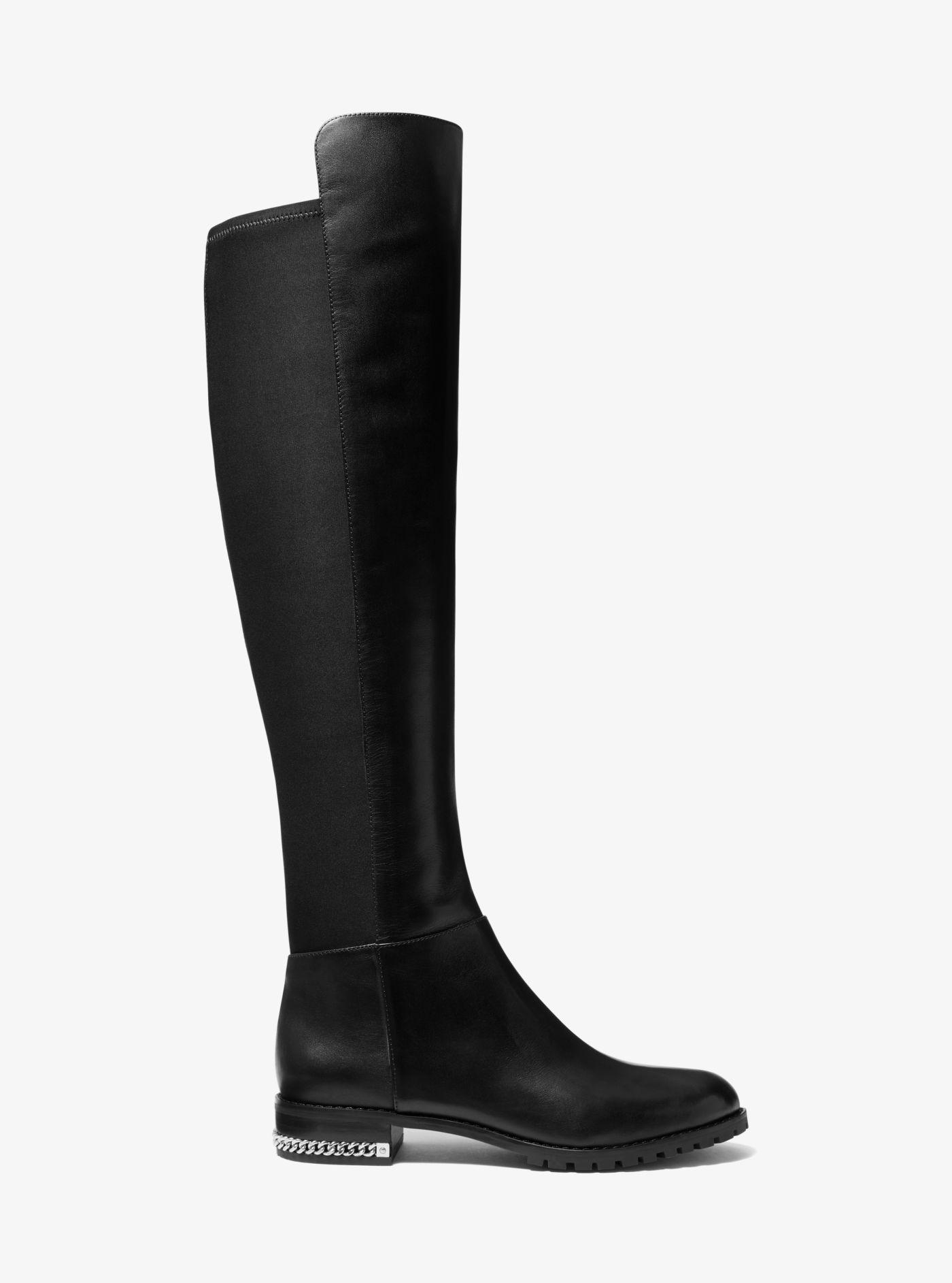 Total 54+ imagen michael kors black and white boots - Giaoduchtn.edu.vn