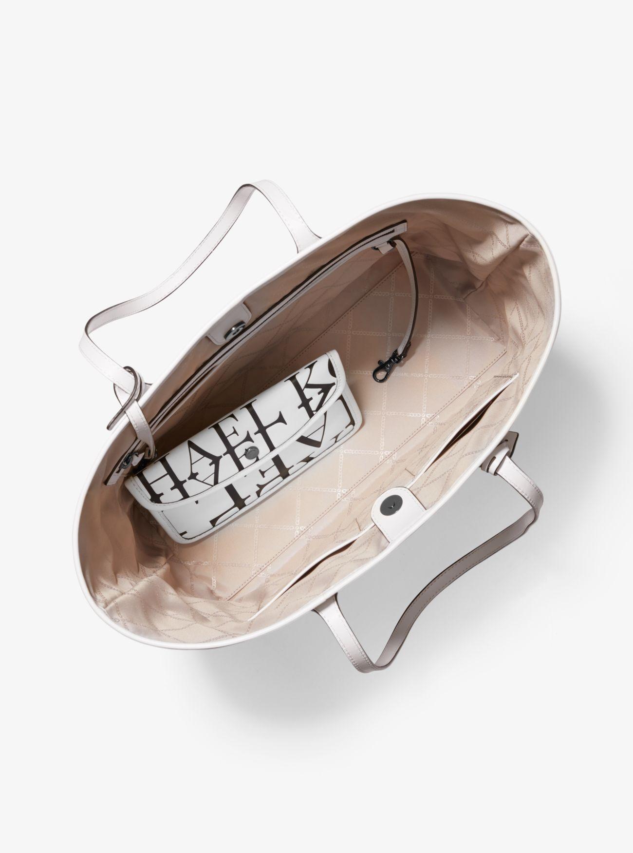 Michael kors newspaper print bag hot sale