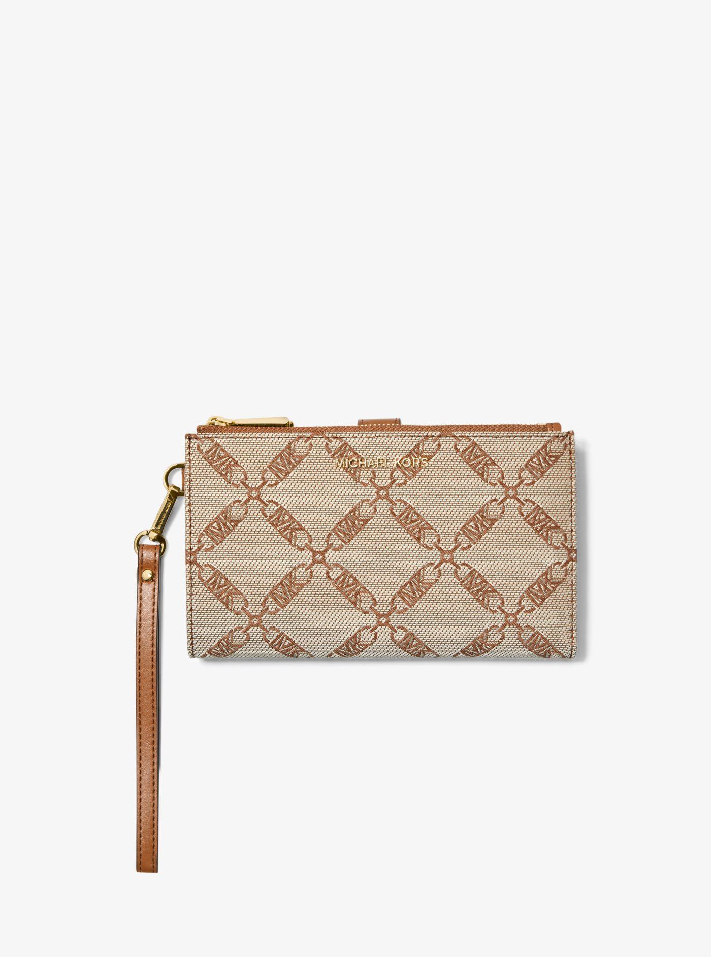 Adele logo hotsell jacquard smartphone wallet