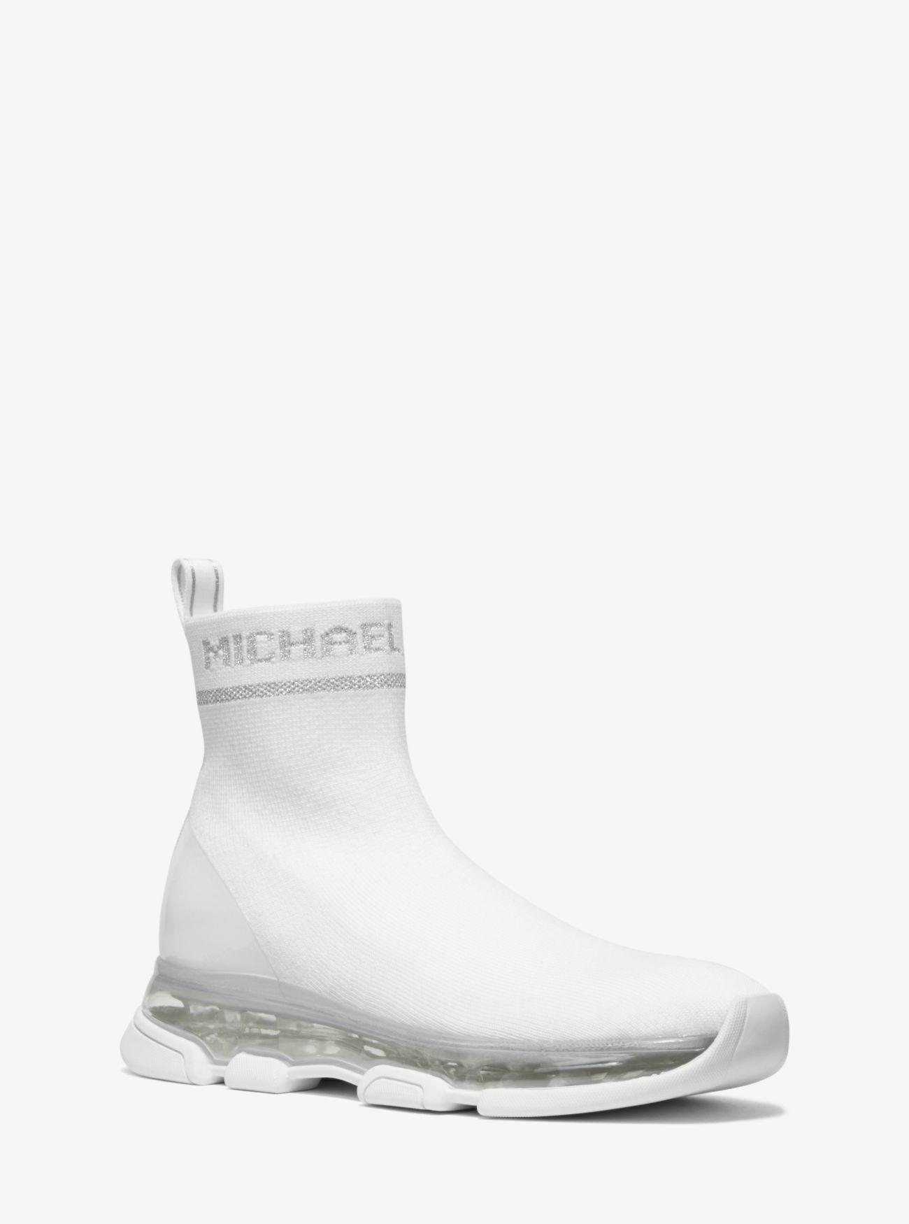 Zapatilla Kendra Tipo Calcetín De Punto Elástico Michael Kors de Tejido  sintético de color Blanco | Lyst