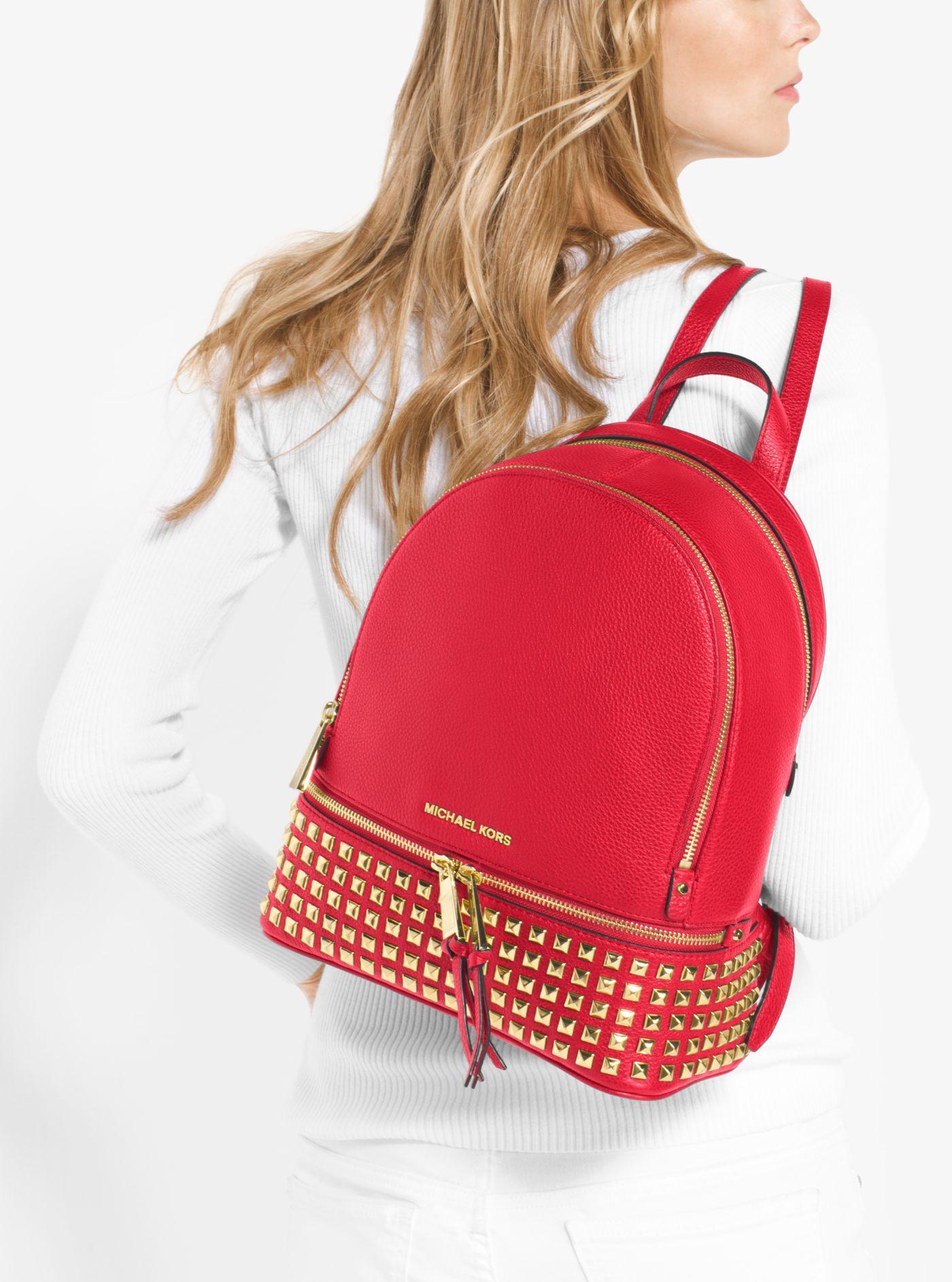 michael kors red studded backpack