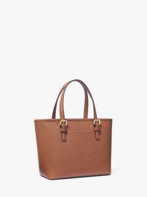 jet set saffiano travel tote bag peanut Michael Kors Izzy Small Shoulder grained cow leather Crafted from Saffiano leather with polished hardware it features multiple zip compartments that will keep all your belongings easily organized Michael Kors Chestnut Brown Saffiano