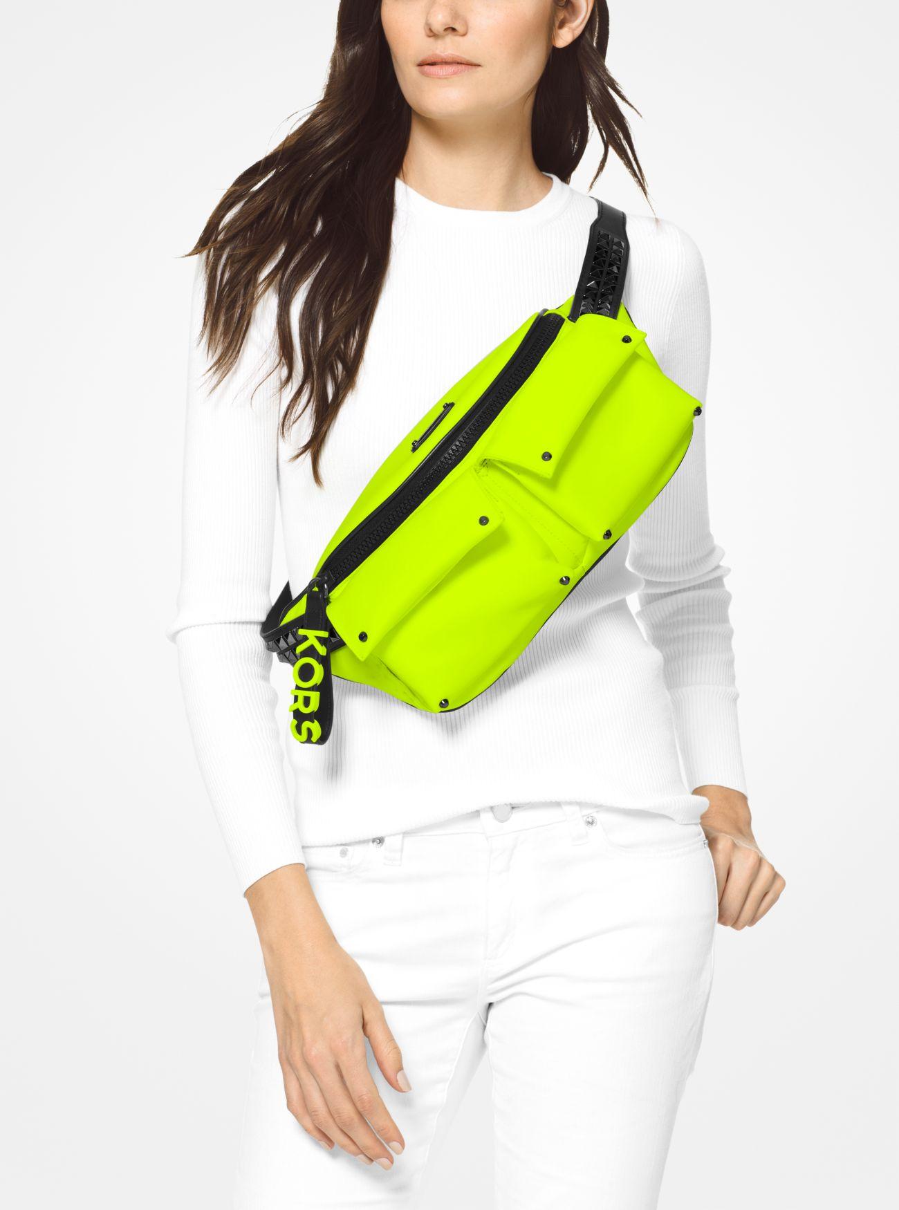 MICHAEL Michael Kors Olivia Large Neon Satin Belt Bag in Yellow | Lyst