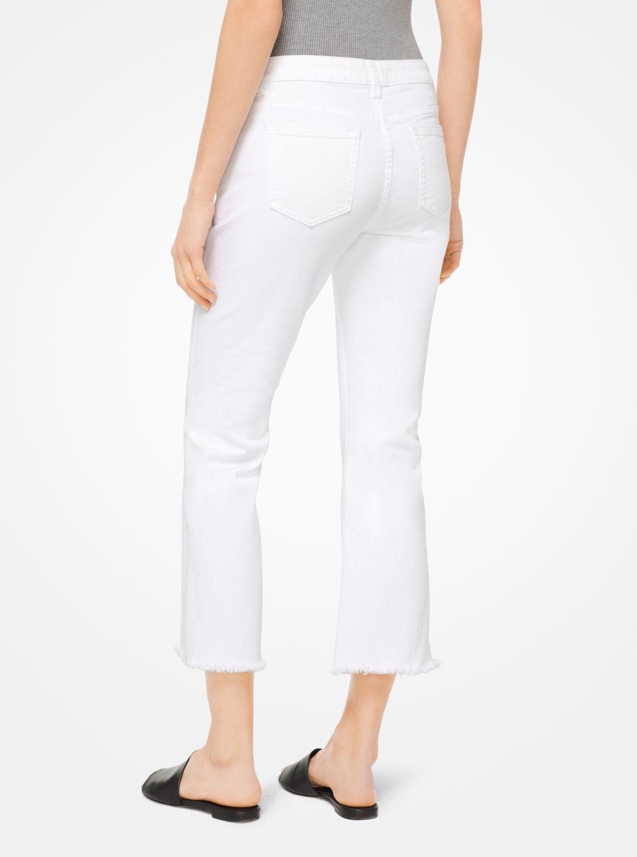 MICHAEL Michael Kors Denim Cropped Flared Jeans in White - Lyst