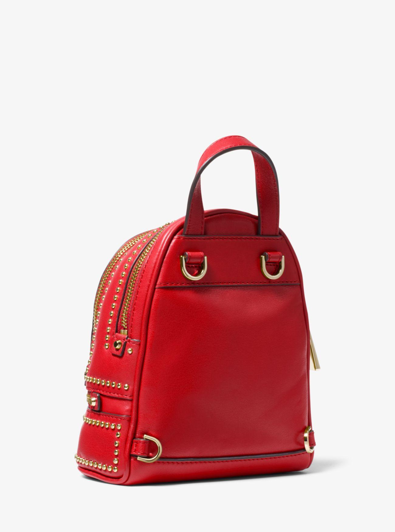 small rose studded leather camera bag