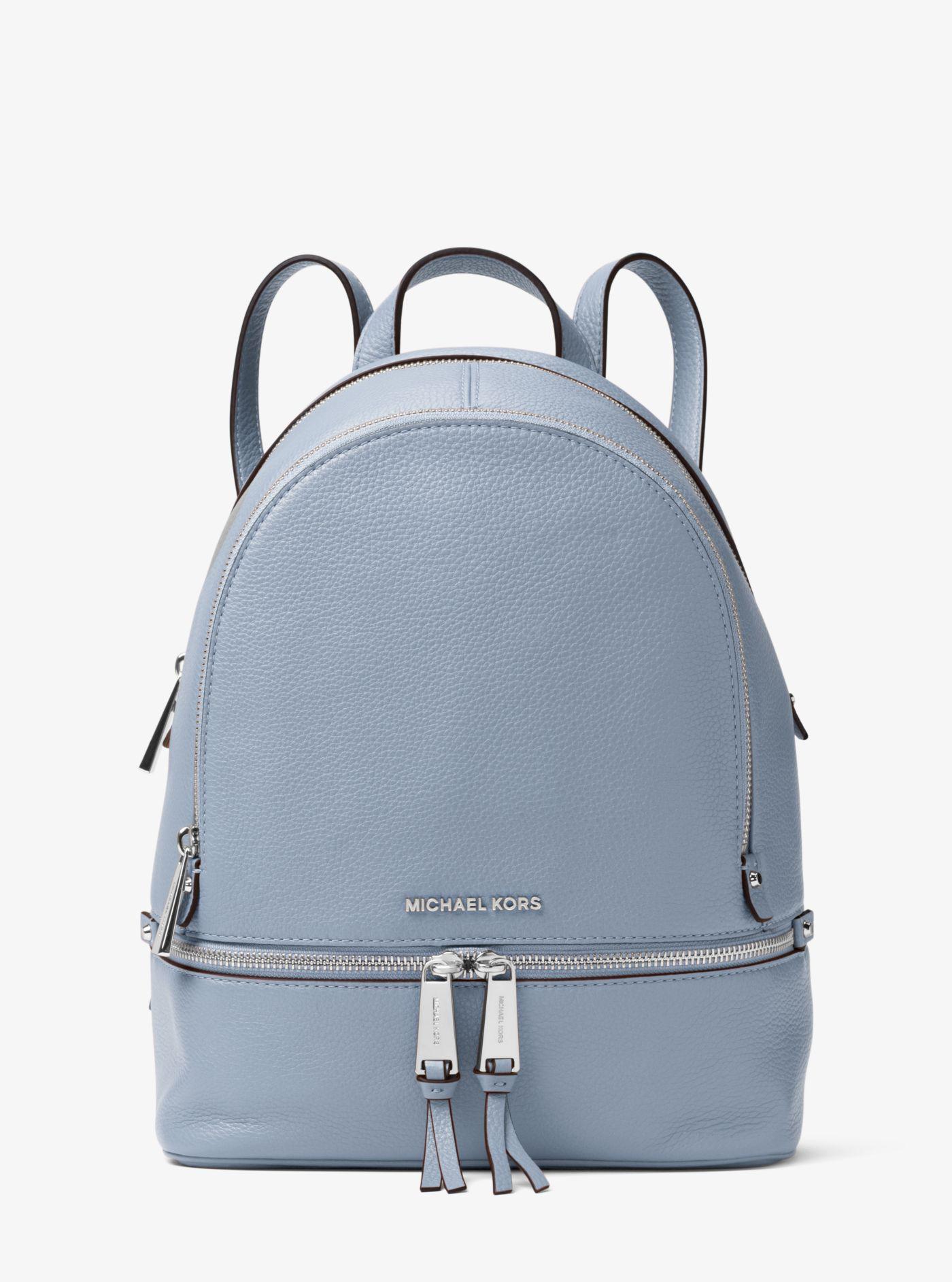 light blue michael kors backpack
