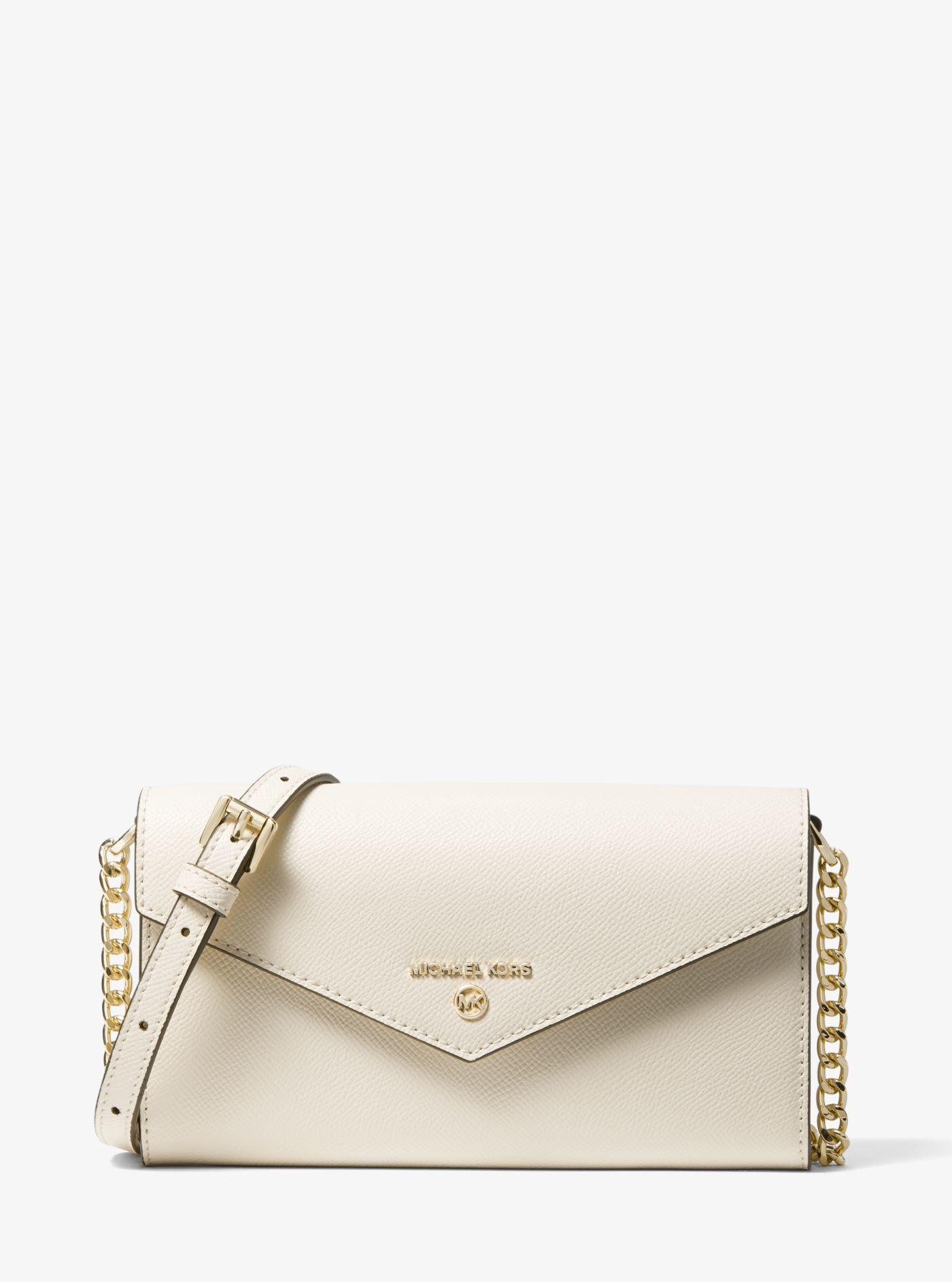 Jet set large logo convertible crossbody bag hotsell