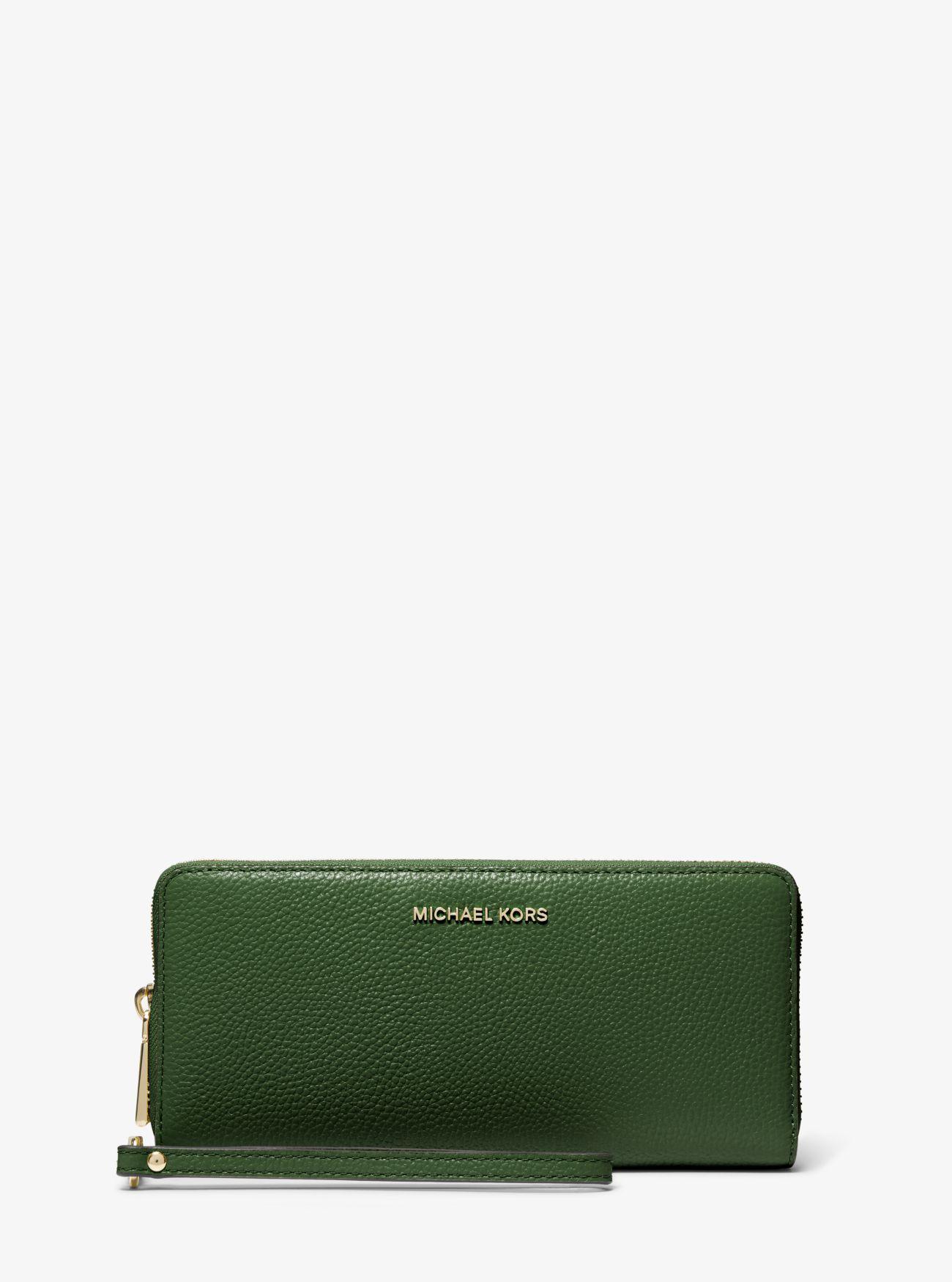 MICHAEL Michael Kors Pebbled Leather Continental Wristlet in Green | Lyst UK