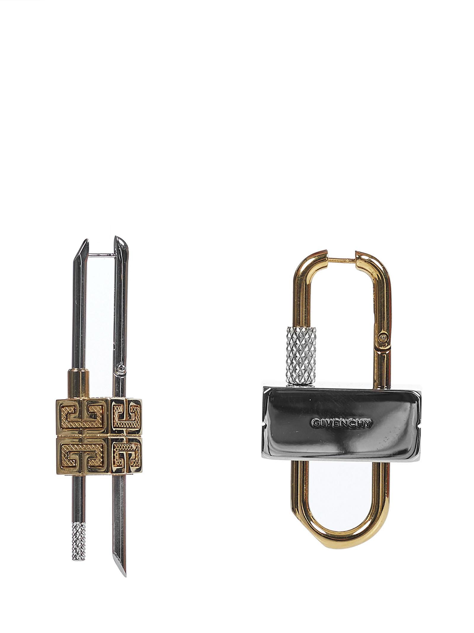 love the mixed metal and asymmetric details, @givenchy lock earrings