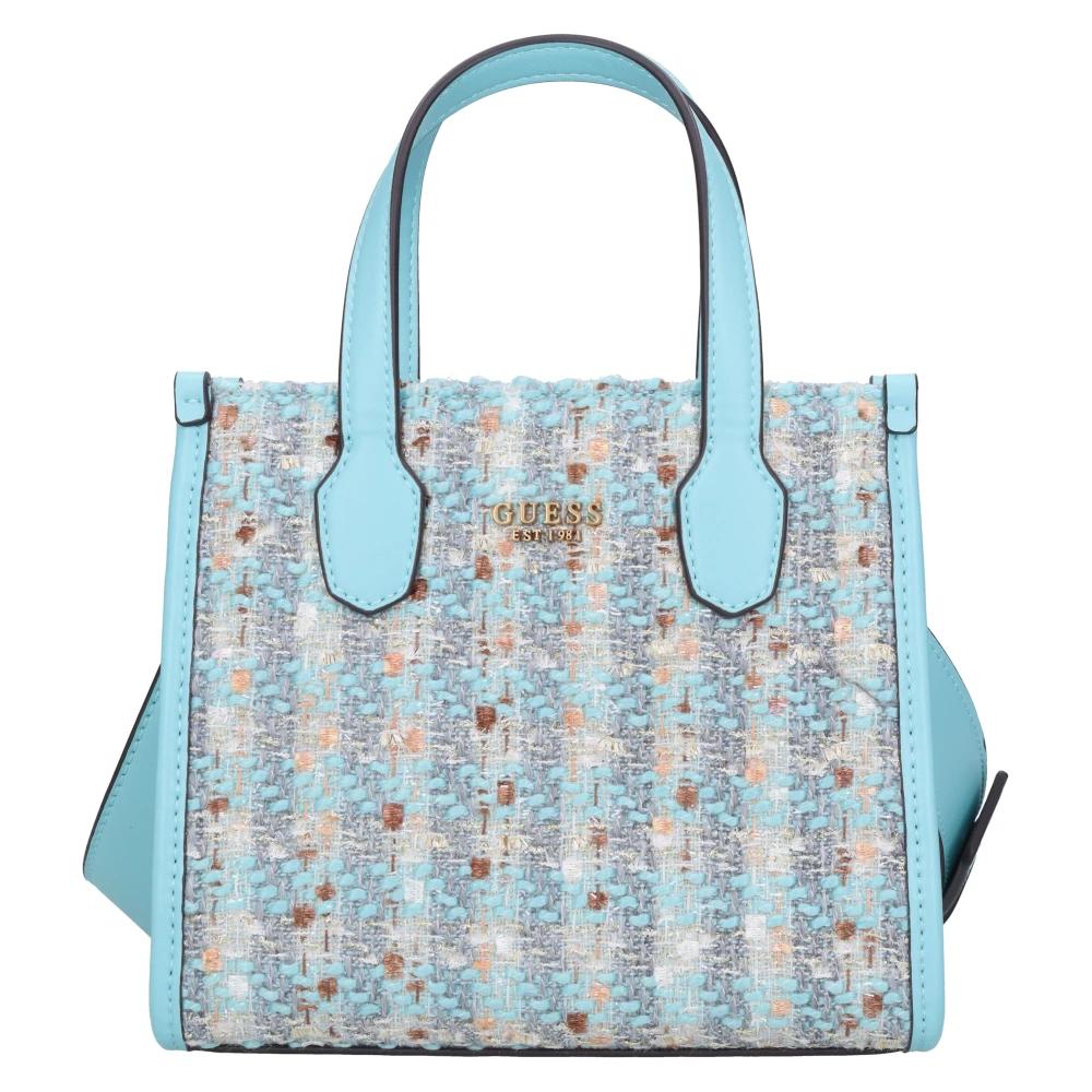 Damen-Shopper Taschen von Guess in Blau Lyst DE