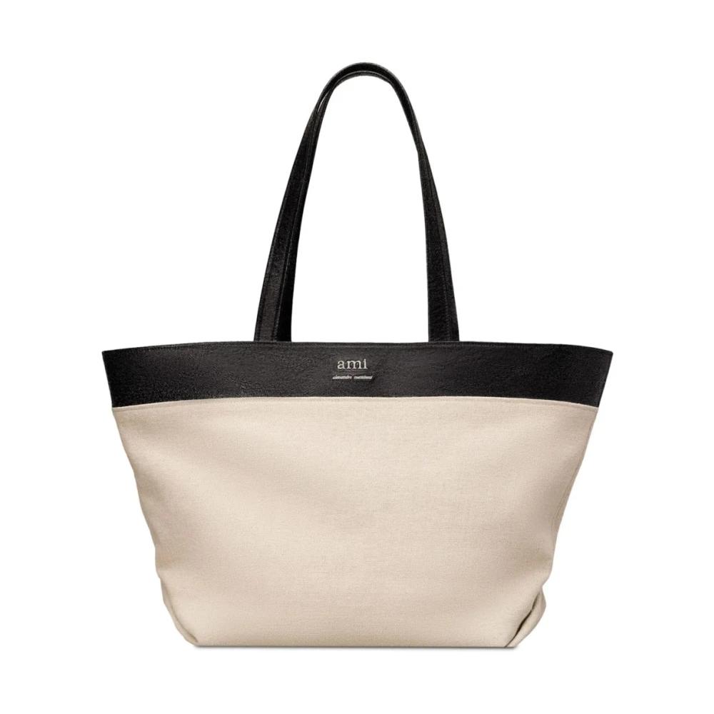 SALE【AMI】ミディトートバッグ ブラック レザー ミディ マキシ トートバッグ ブラック | AMI PARIS