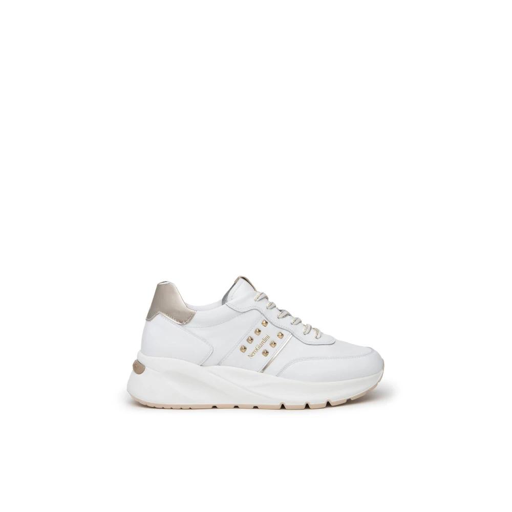 Sneakers bianche con borchie outlet