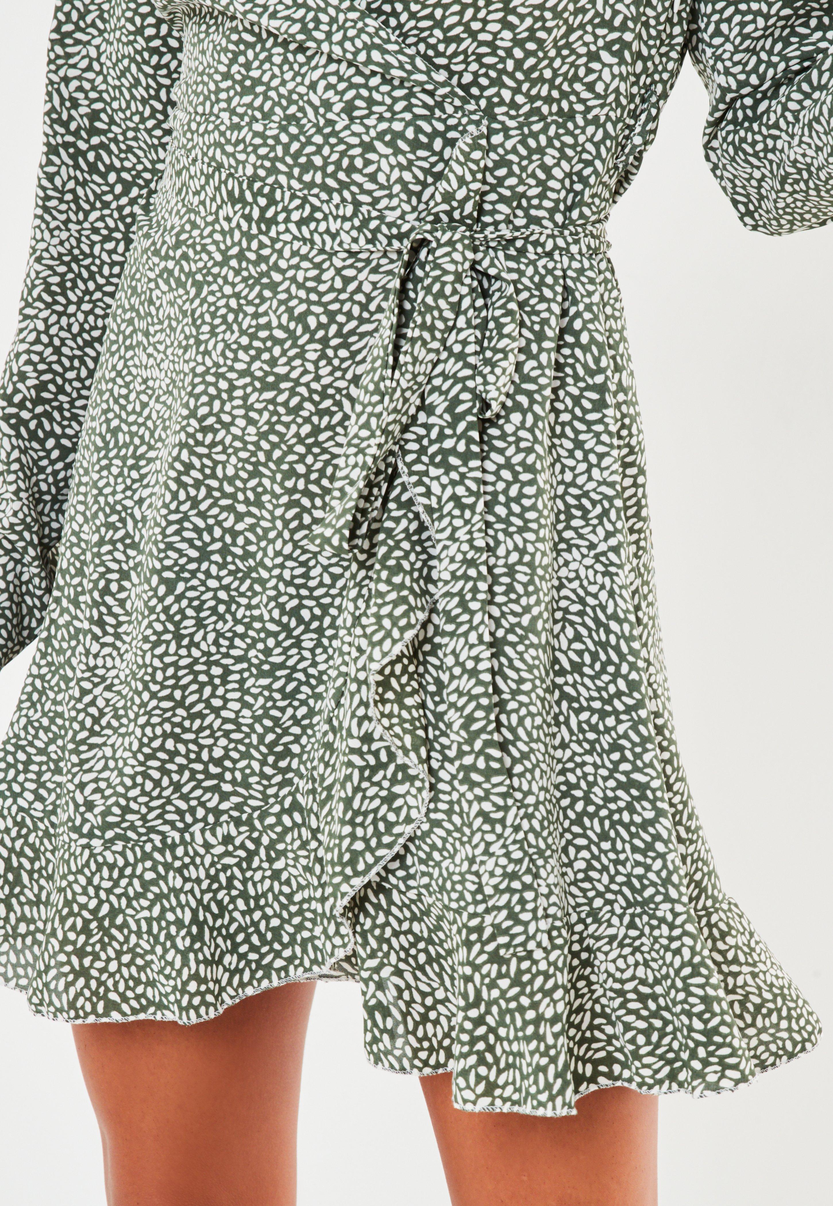 green sprinkle print ruffle wrap tea dress