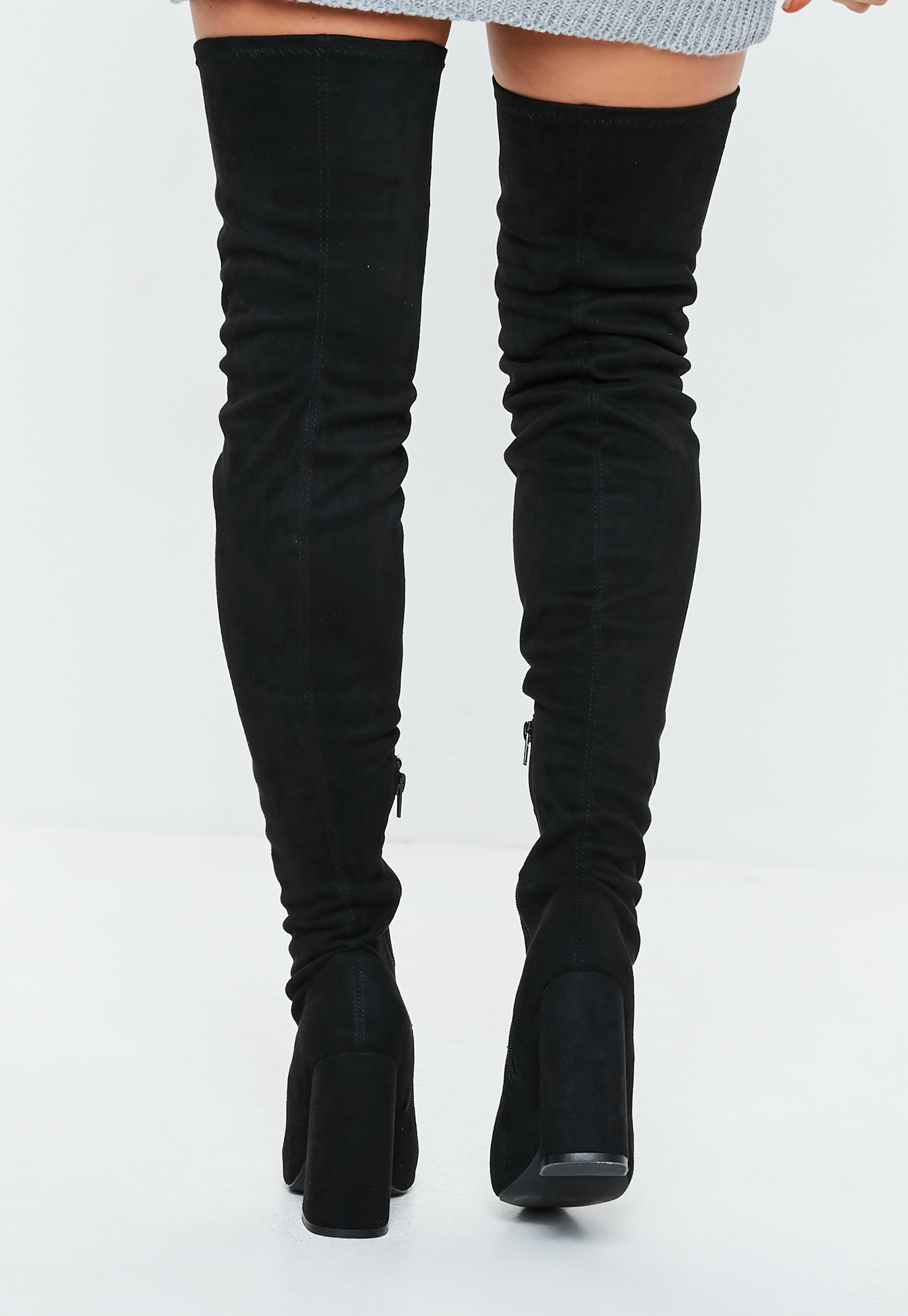 black over the knee flared heel boots