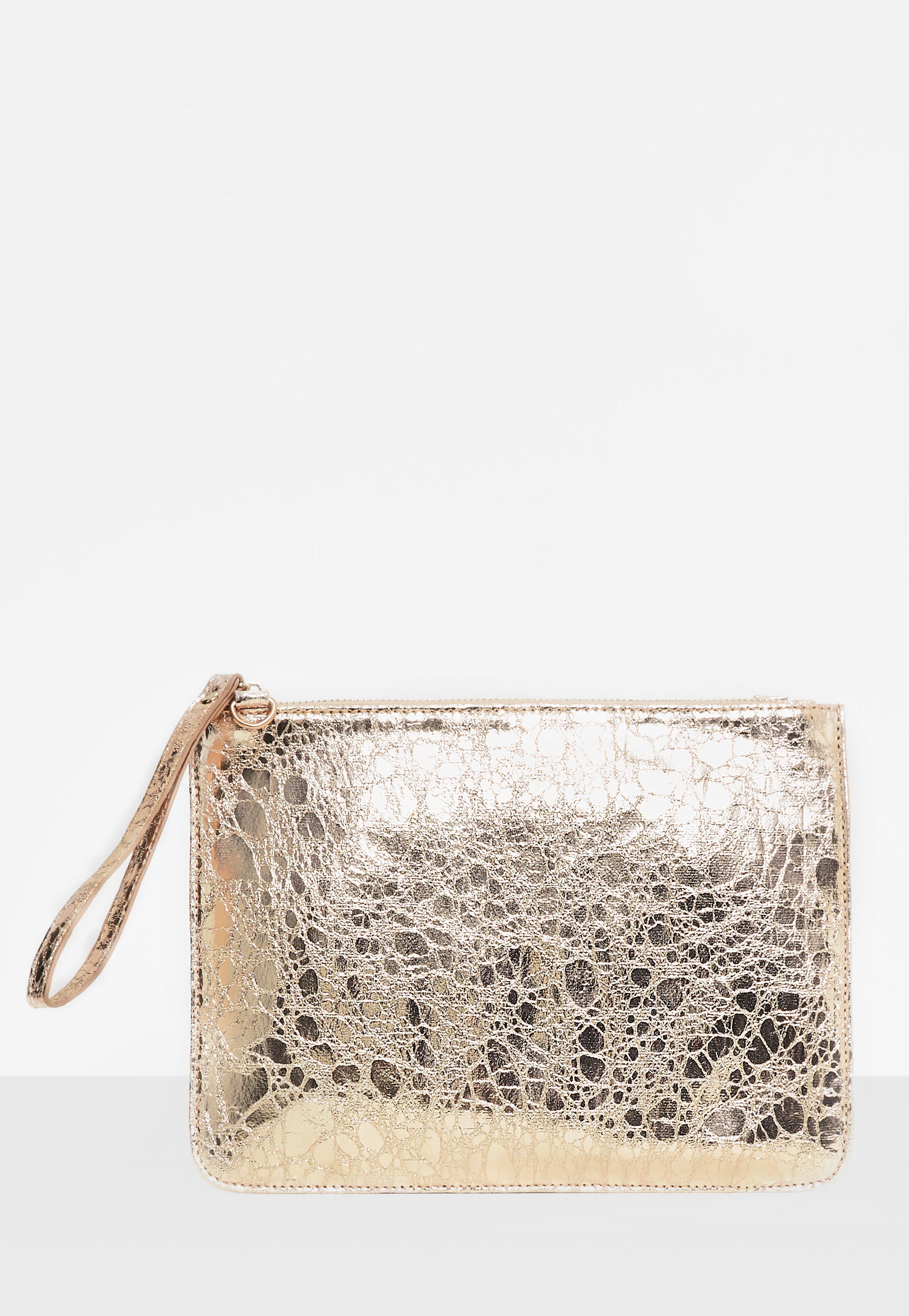 gold wristlet bag