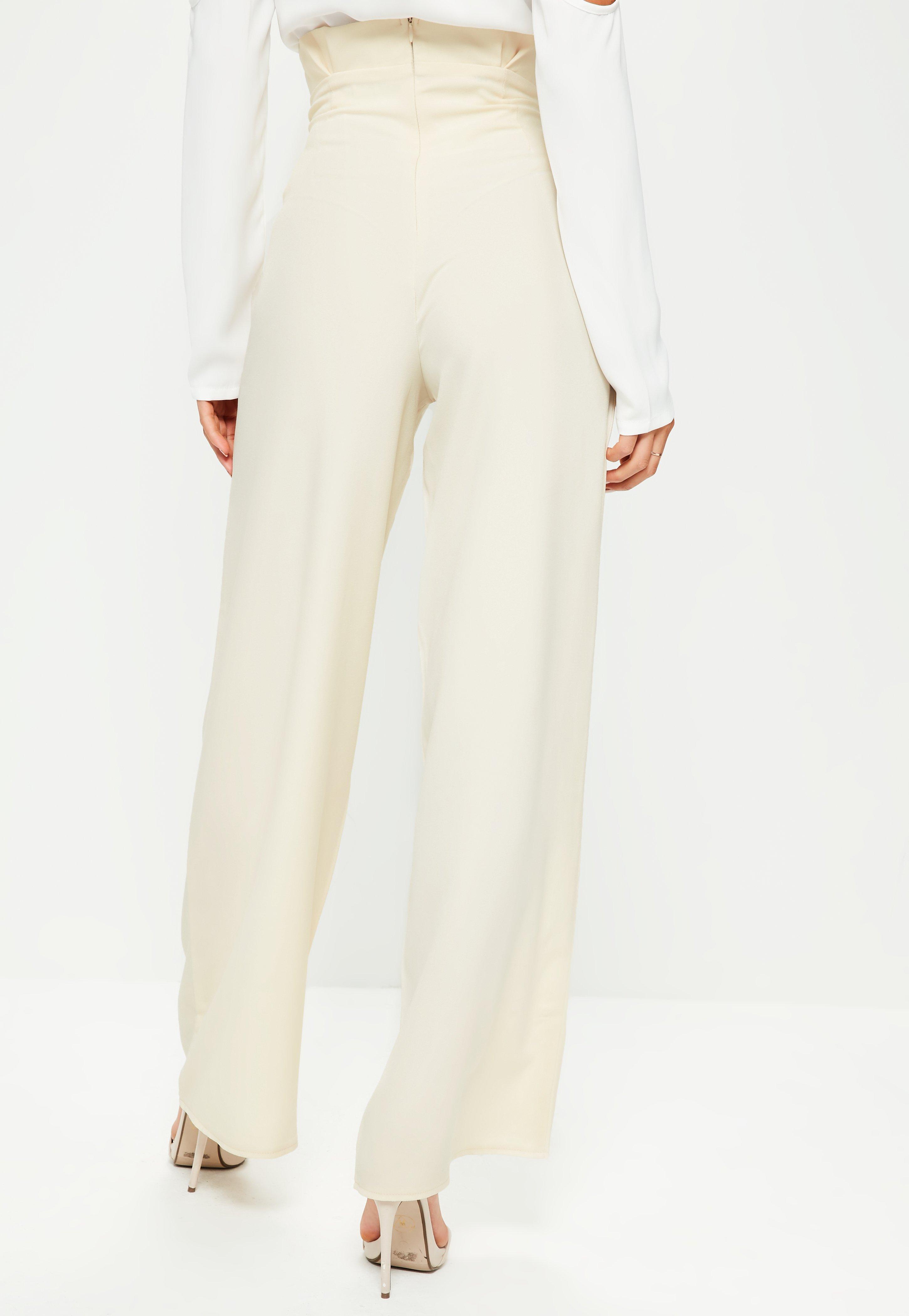 beige high waisted trousers