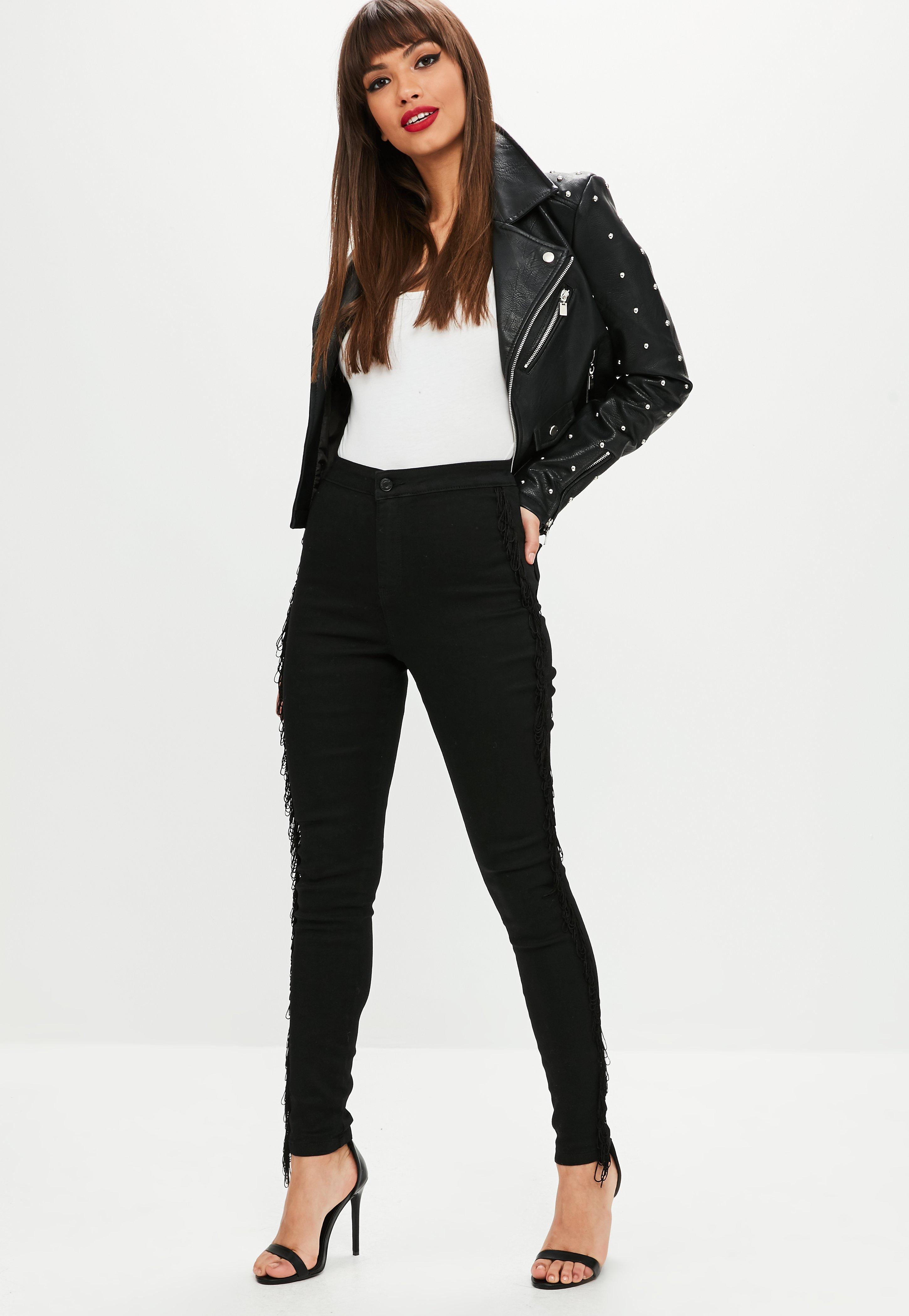 black jeans with fringe on the side