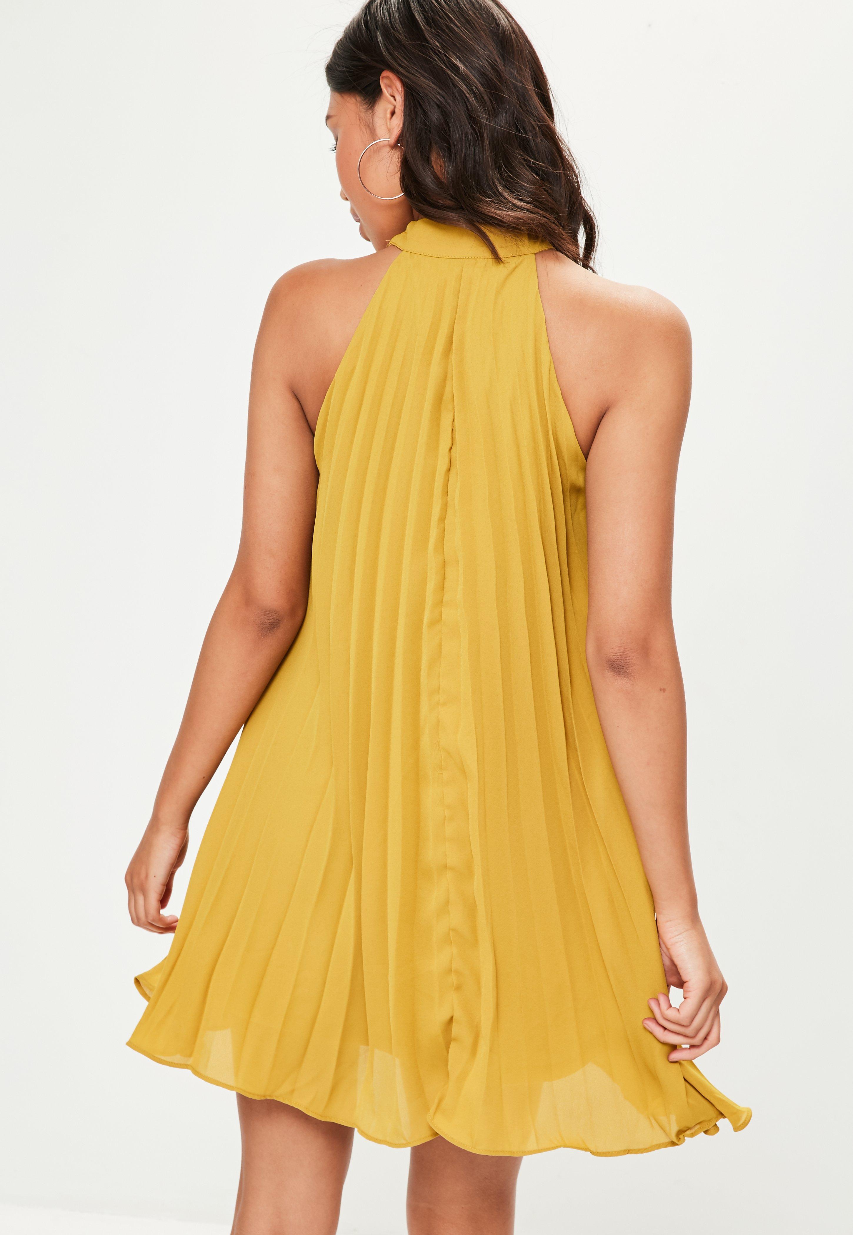 pleated swing dress with halter neck