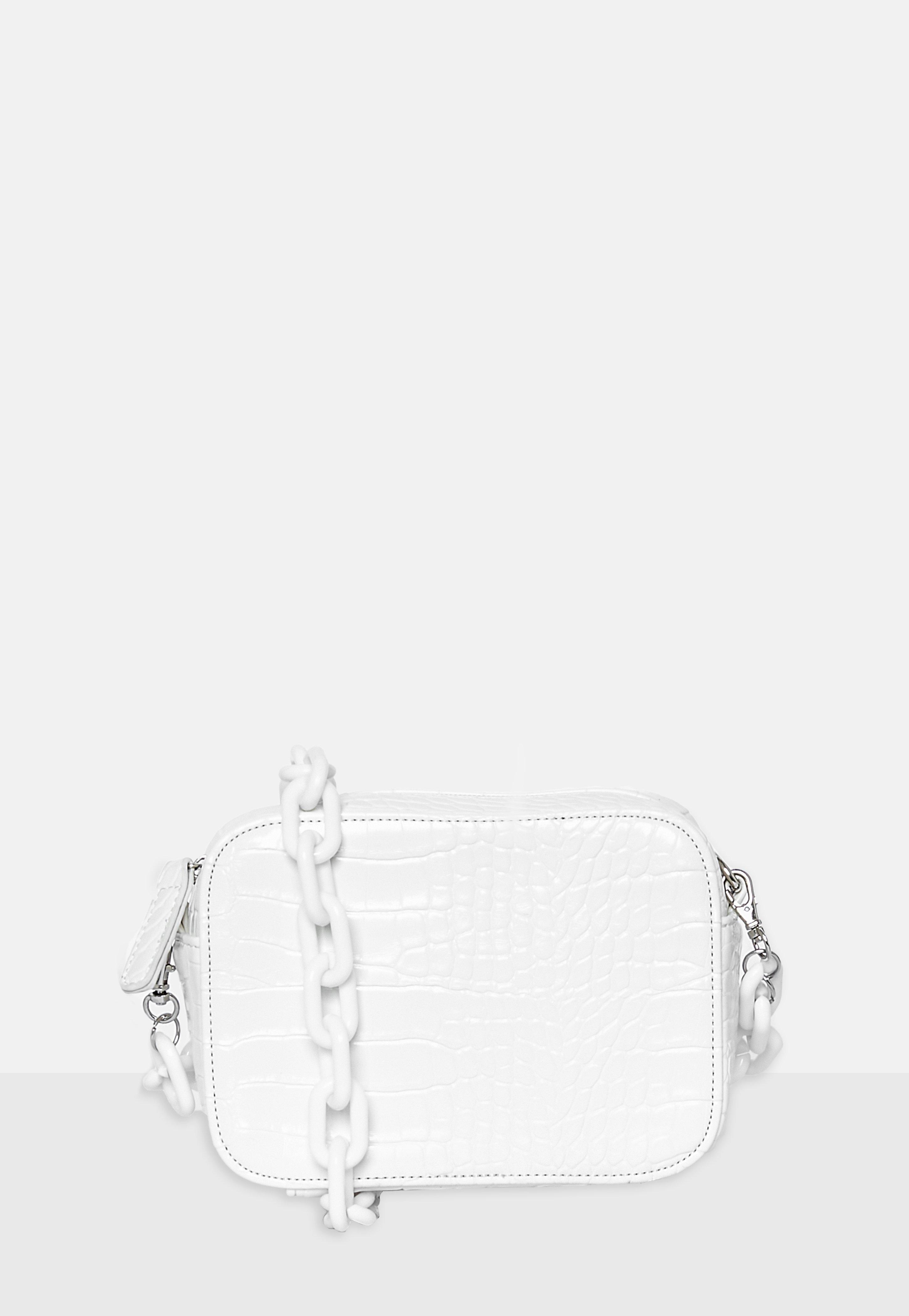 white bag with chain strap