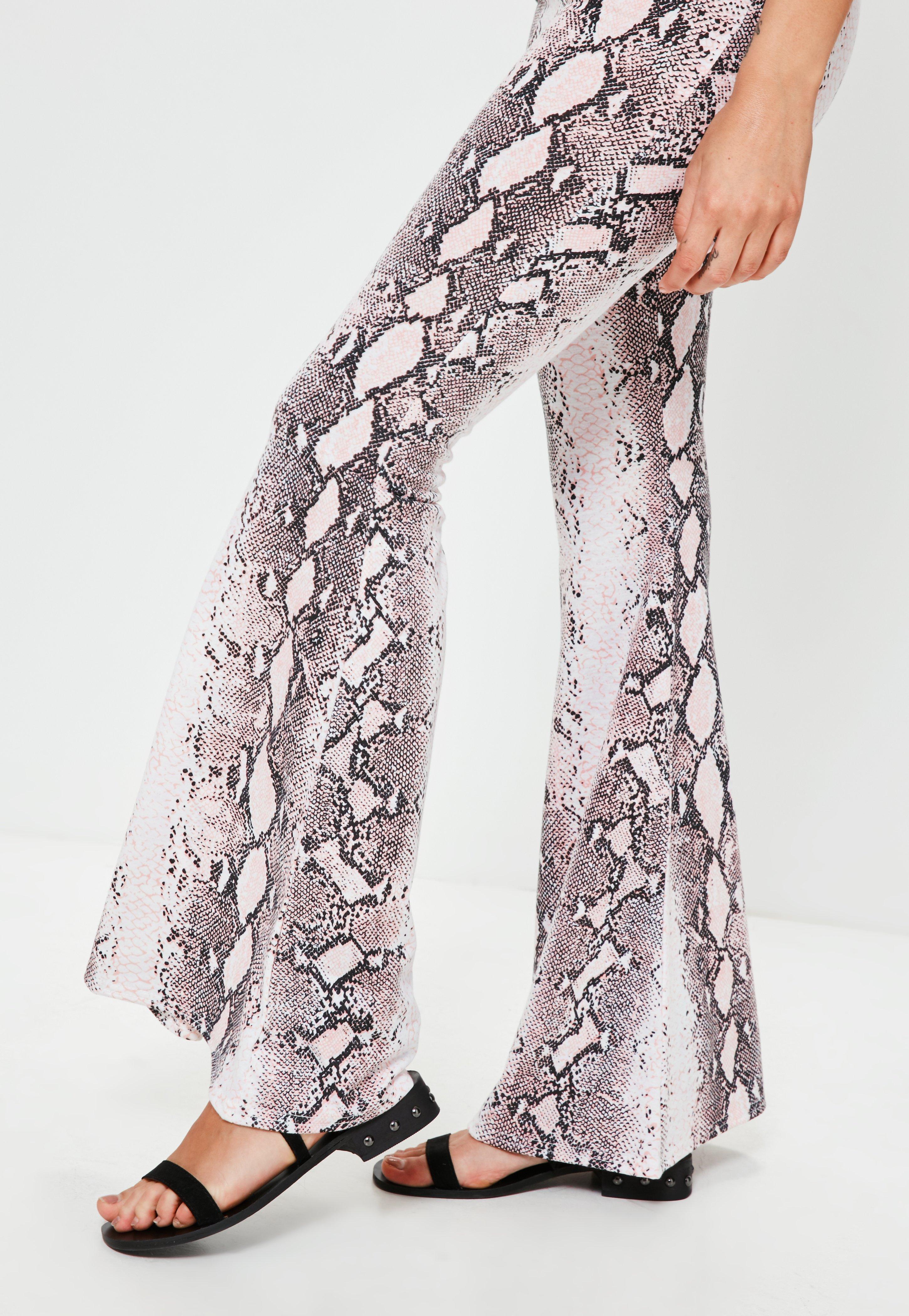 pink snake print flares