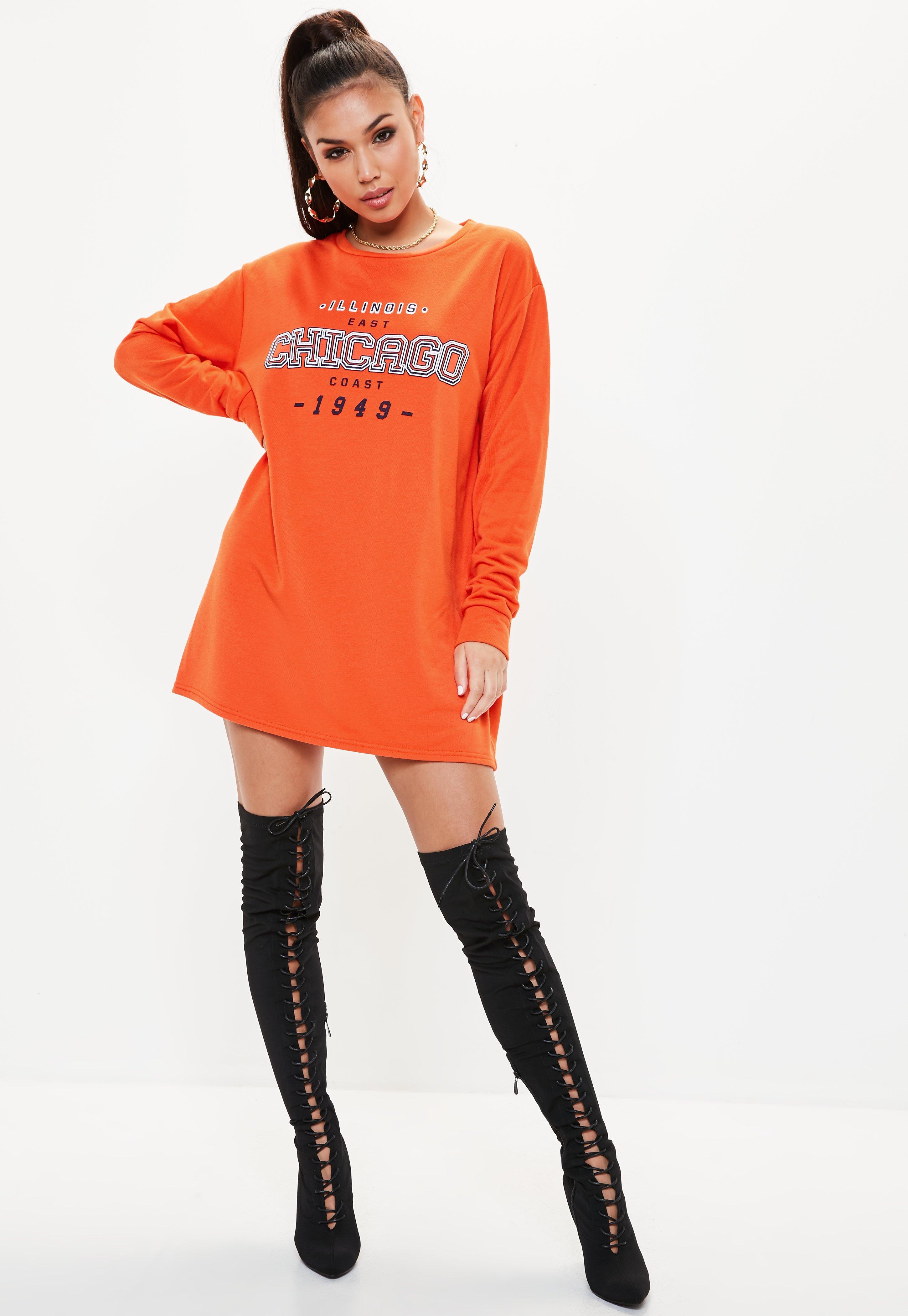 oversized sweater dress with thigh high boots