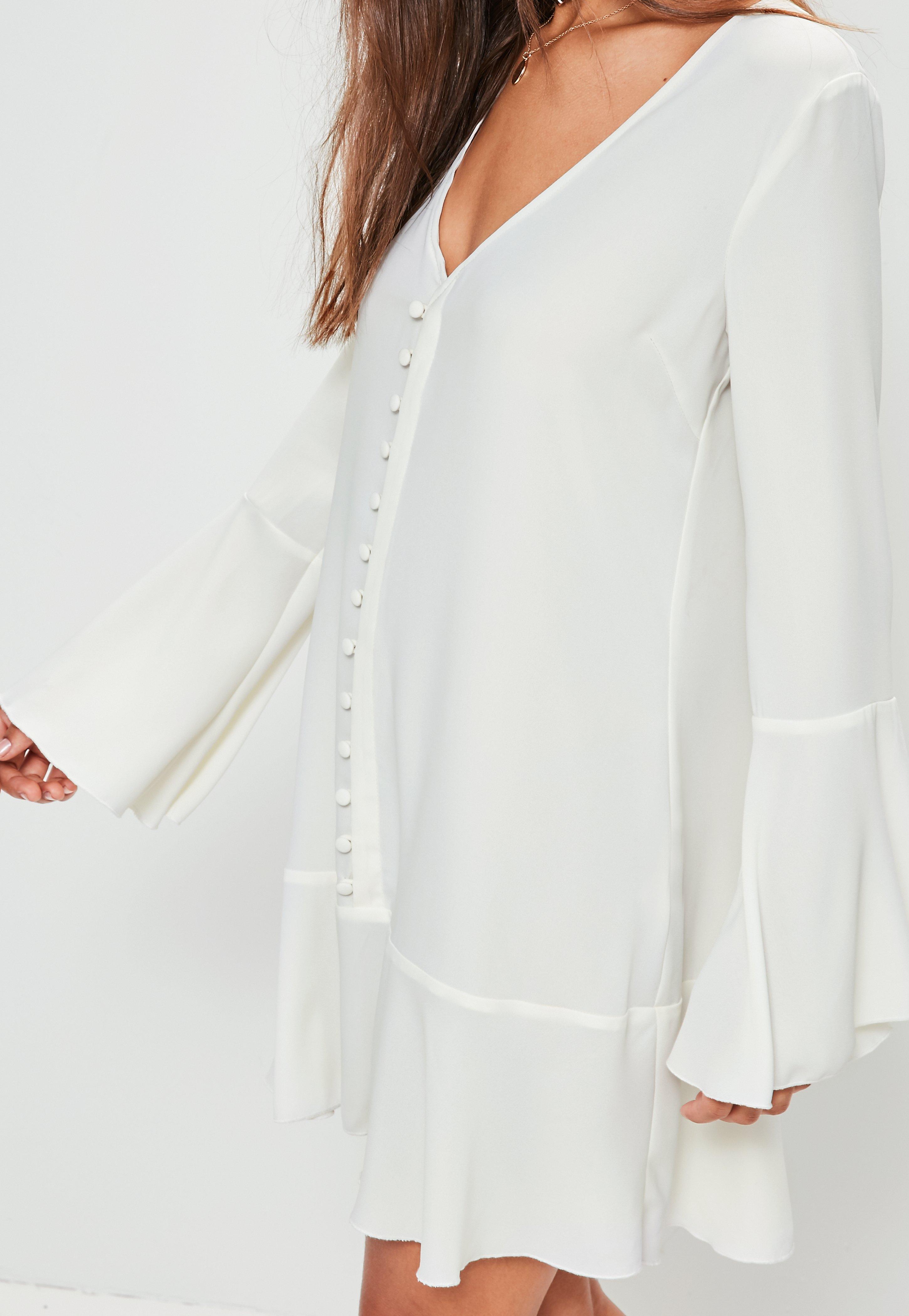 white shirt dress with frill bottom