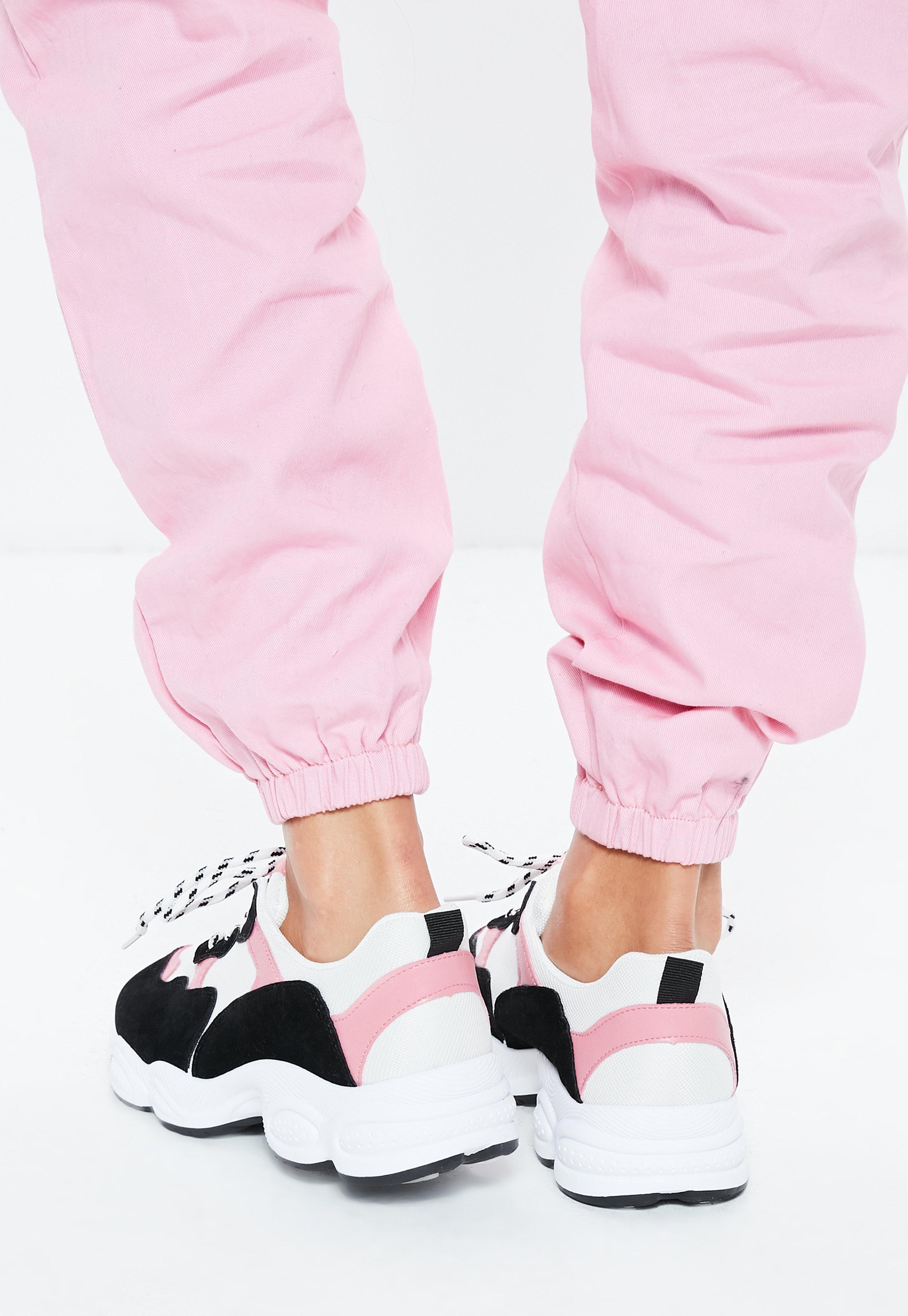 white and pink chunky trainers