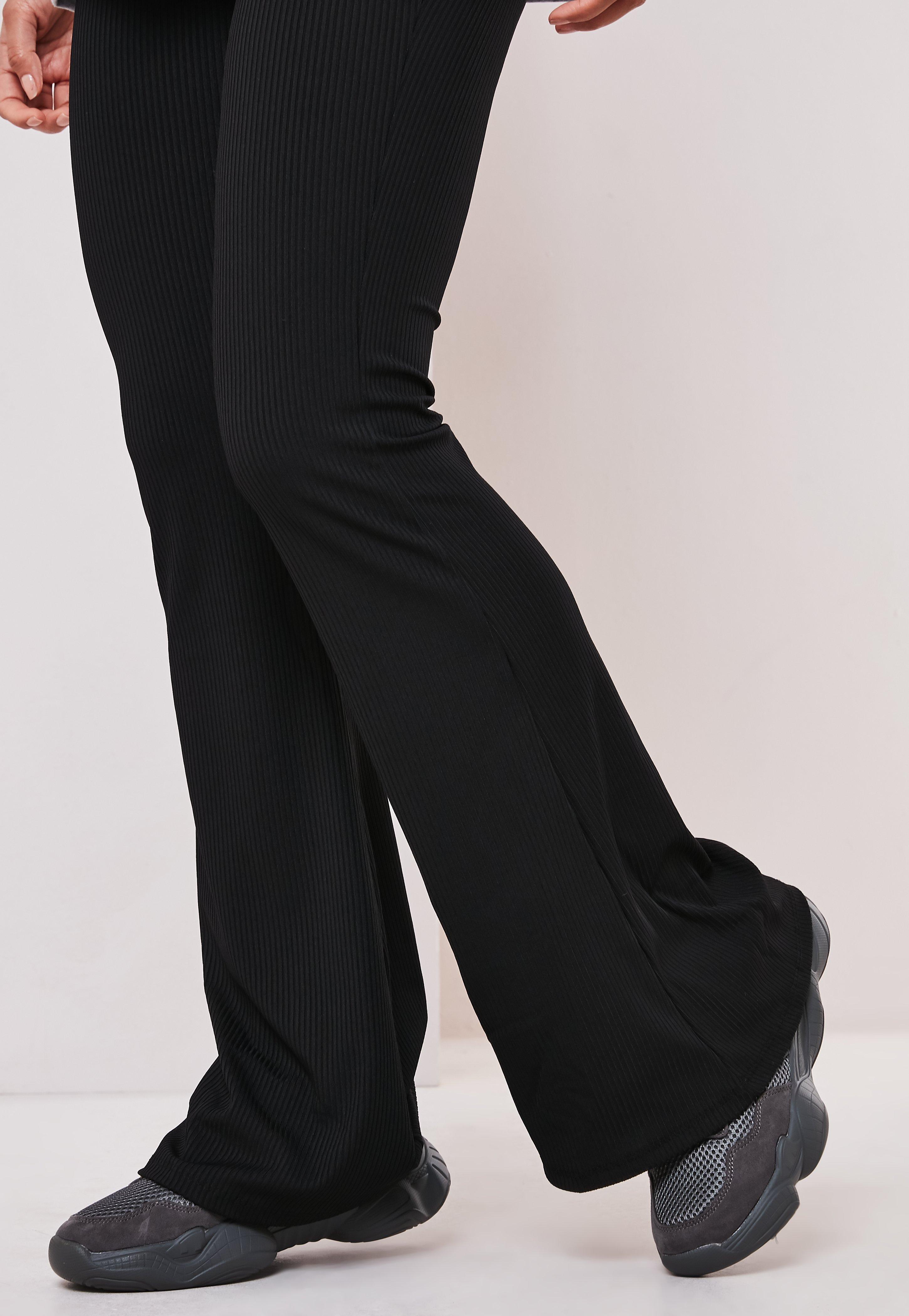 black jersey flare trousers