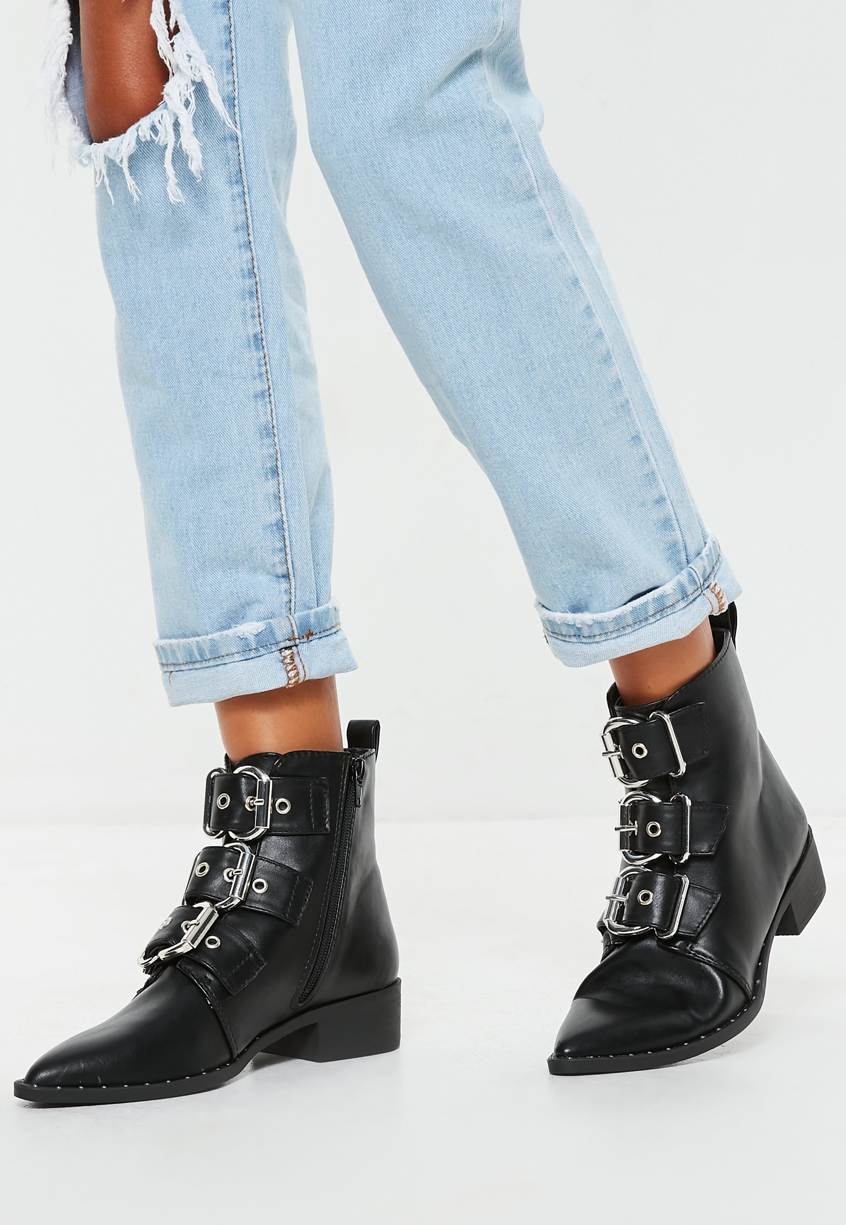 pointed buckle boots