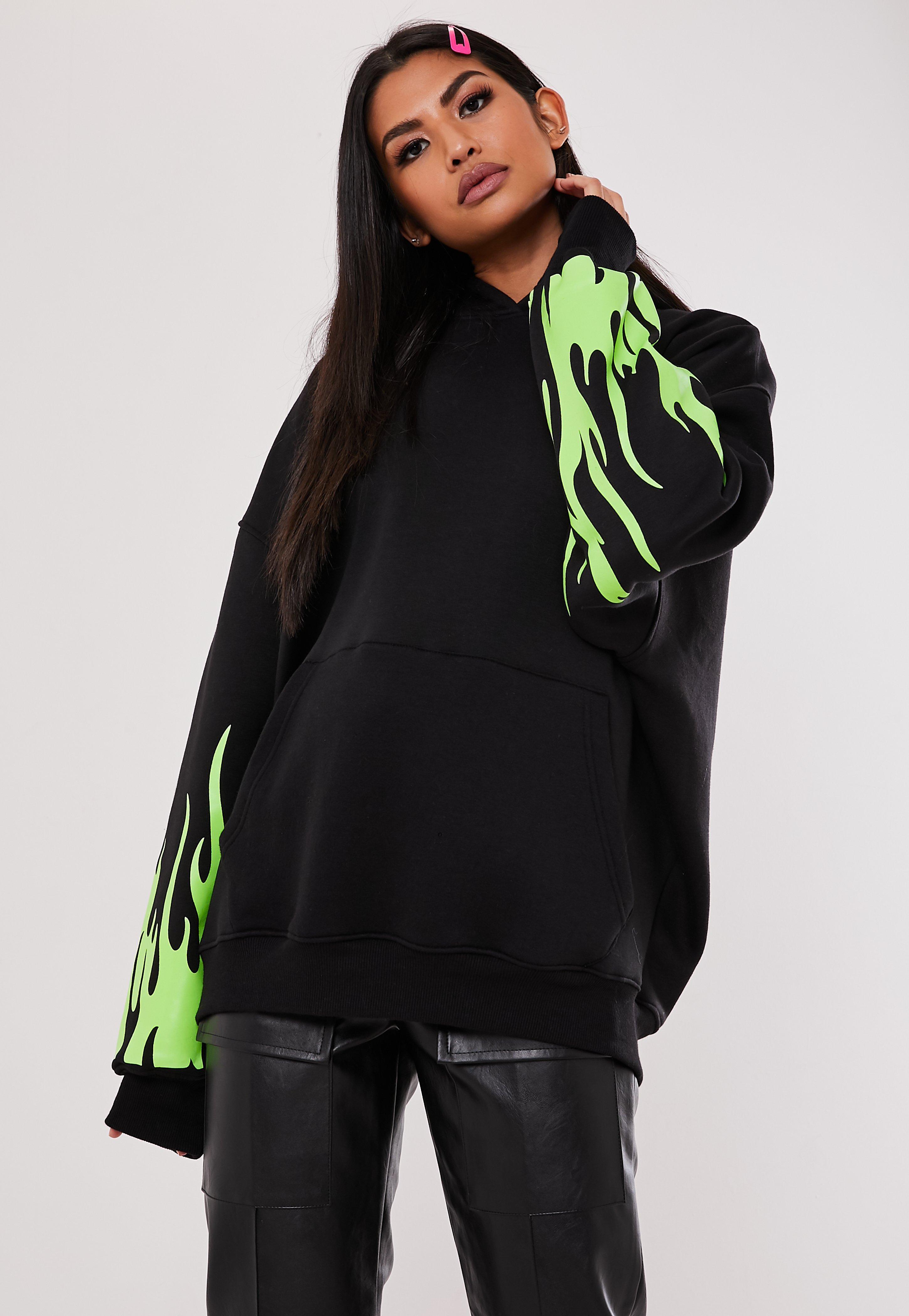 black and neon green sweater
