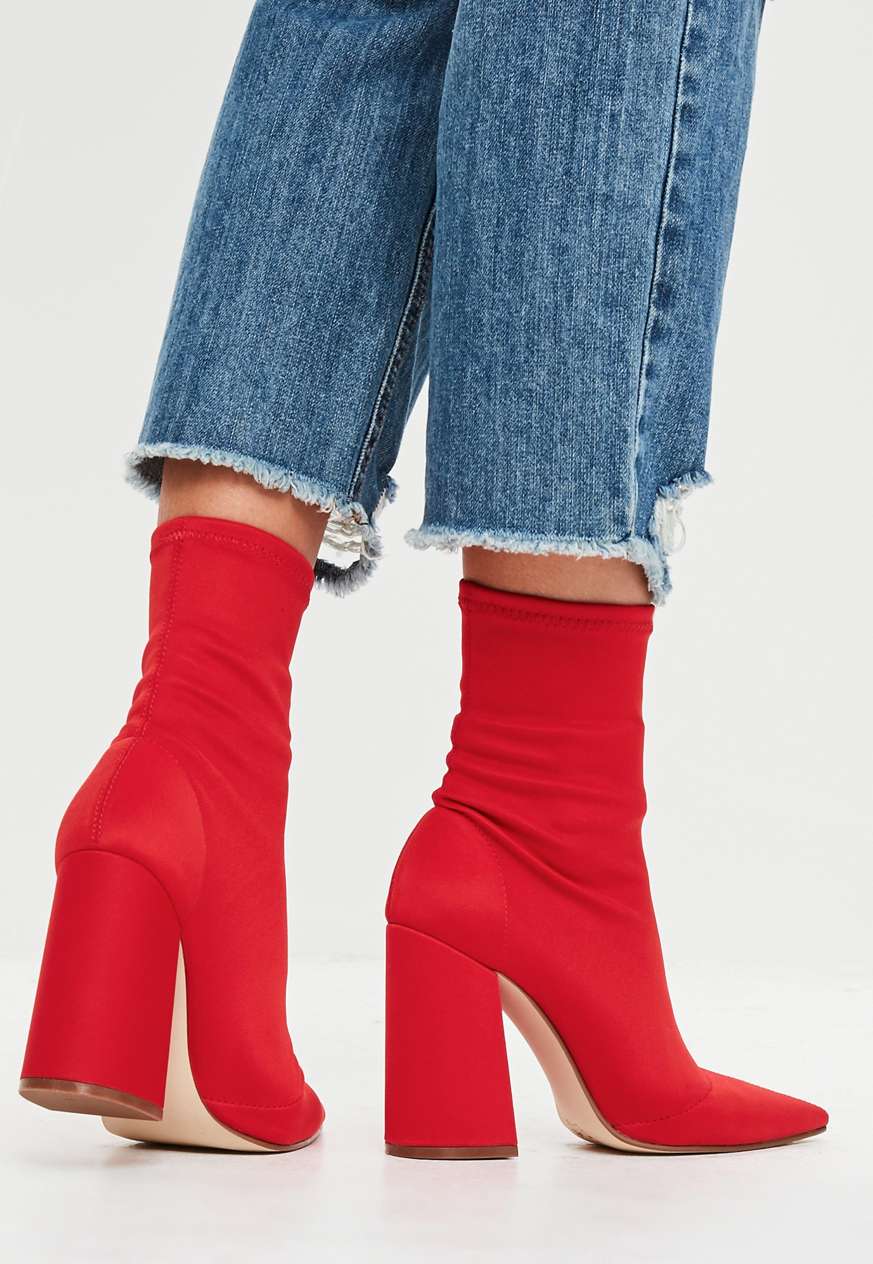 red heeled sock boots