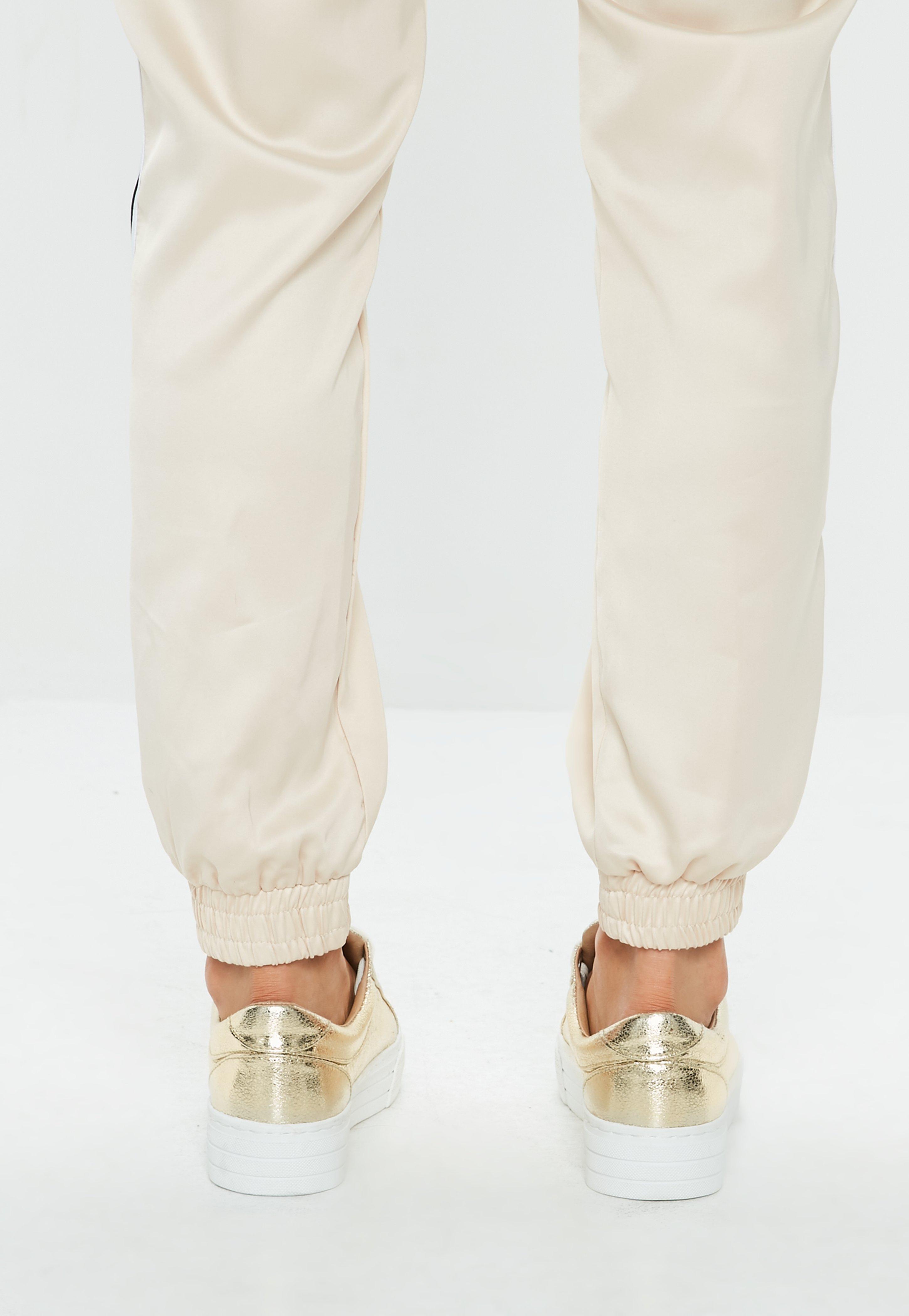 gold flatform trainers
