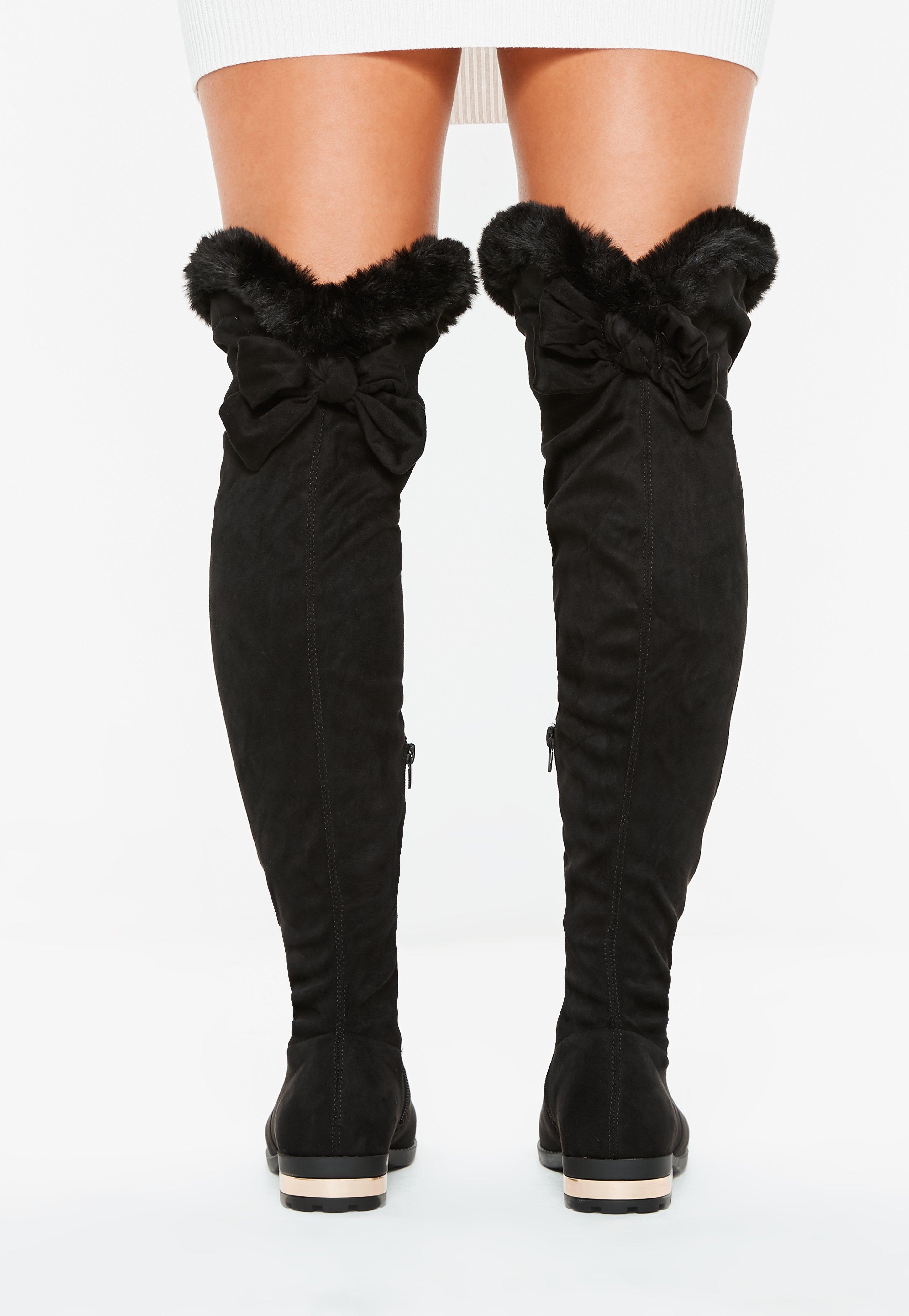 fuzzy knee high boots