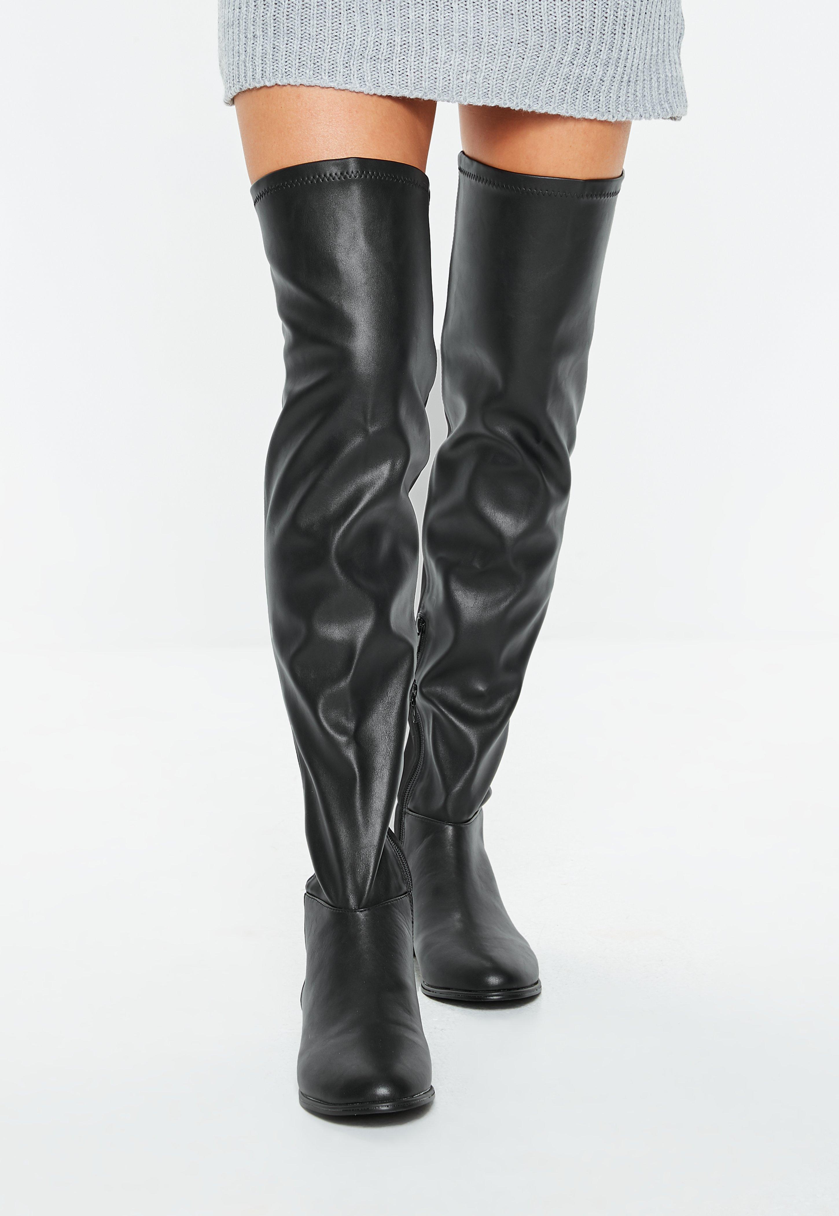 studded over the knee flat boots