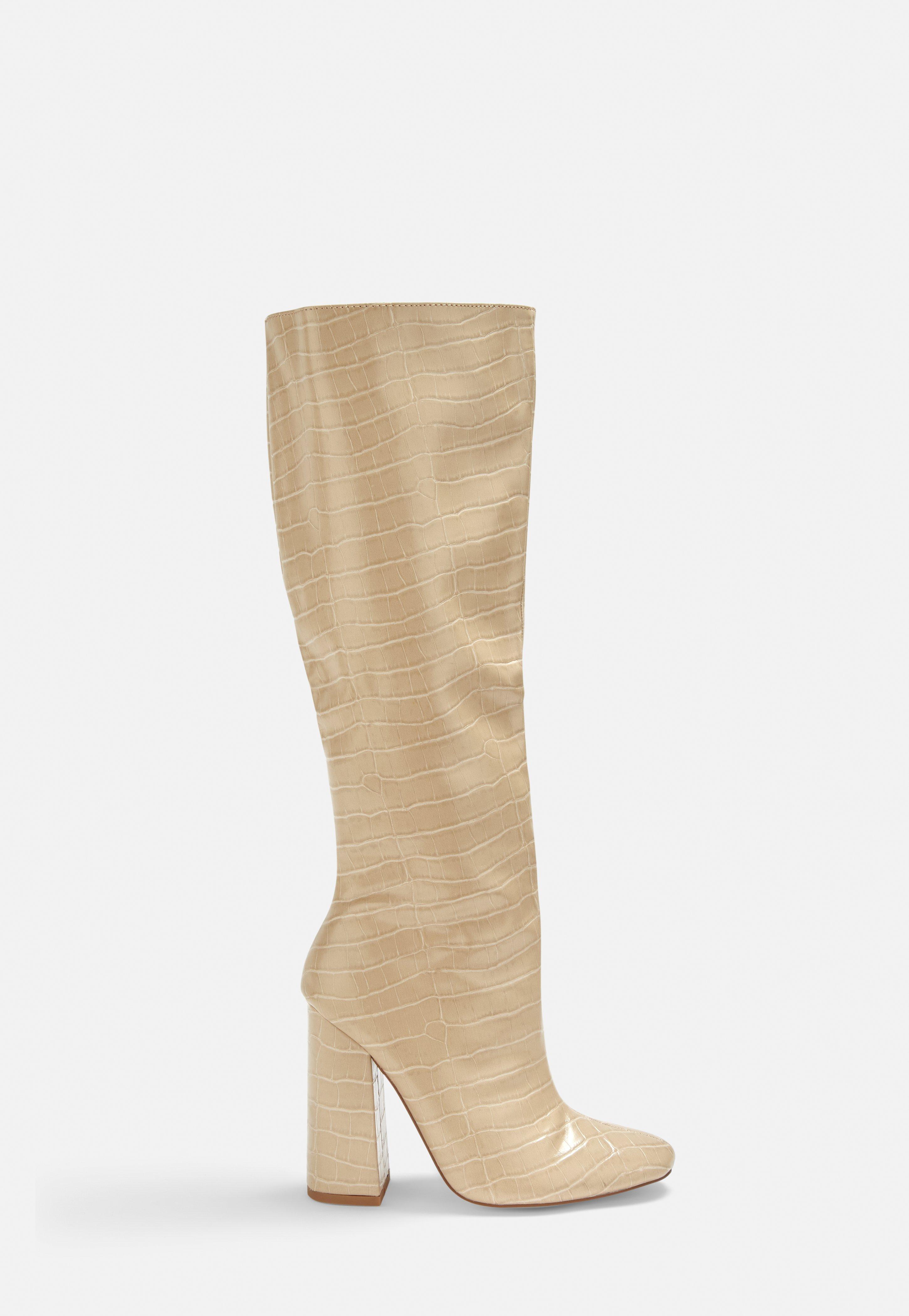 cream heeled boots