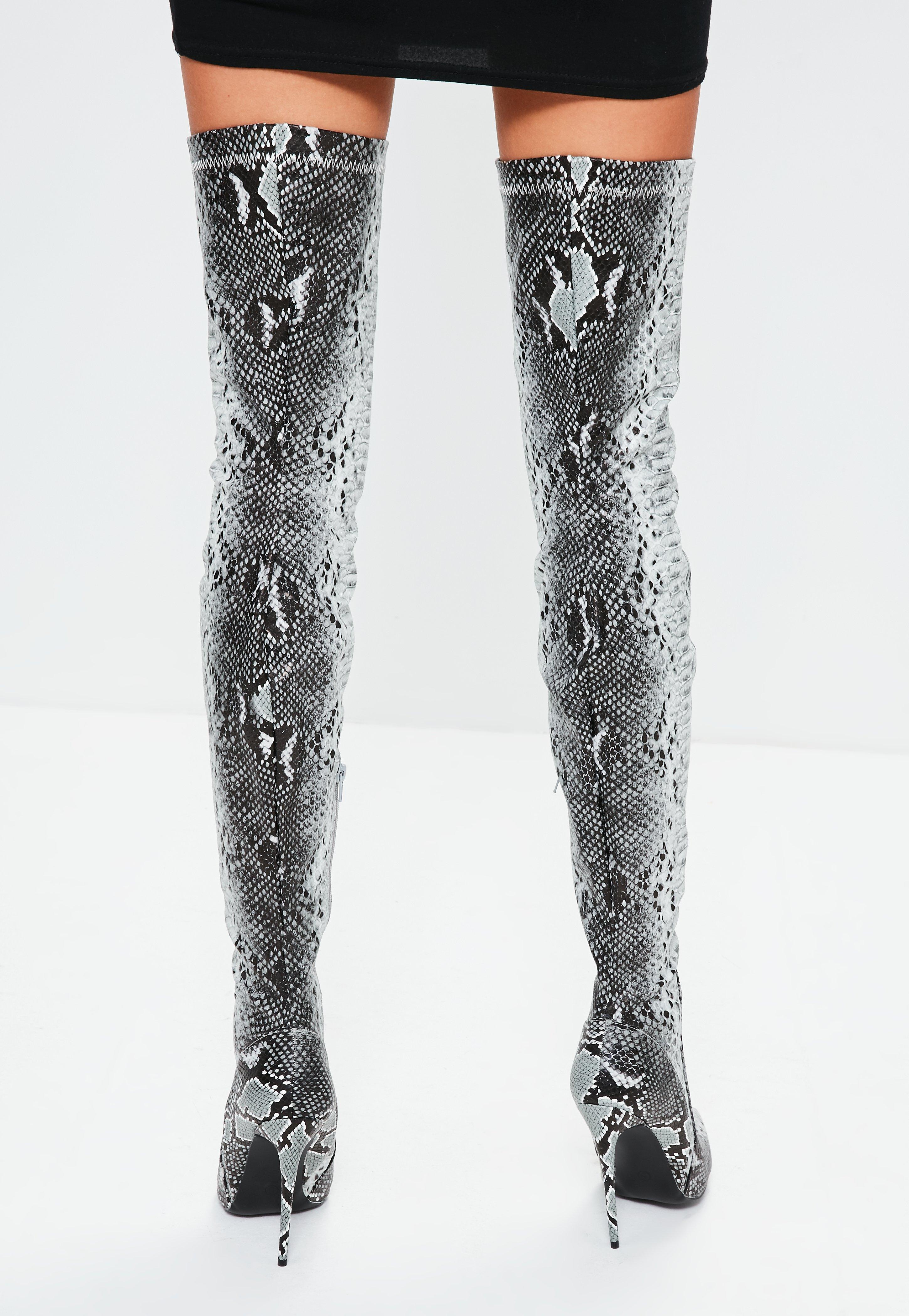 printed thigh high boots