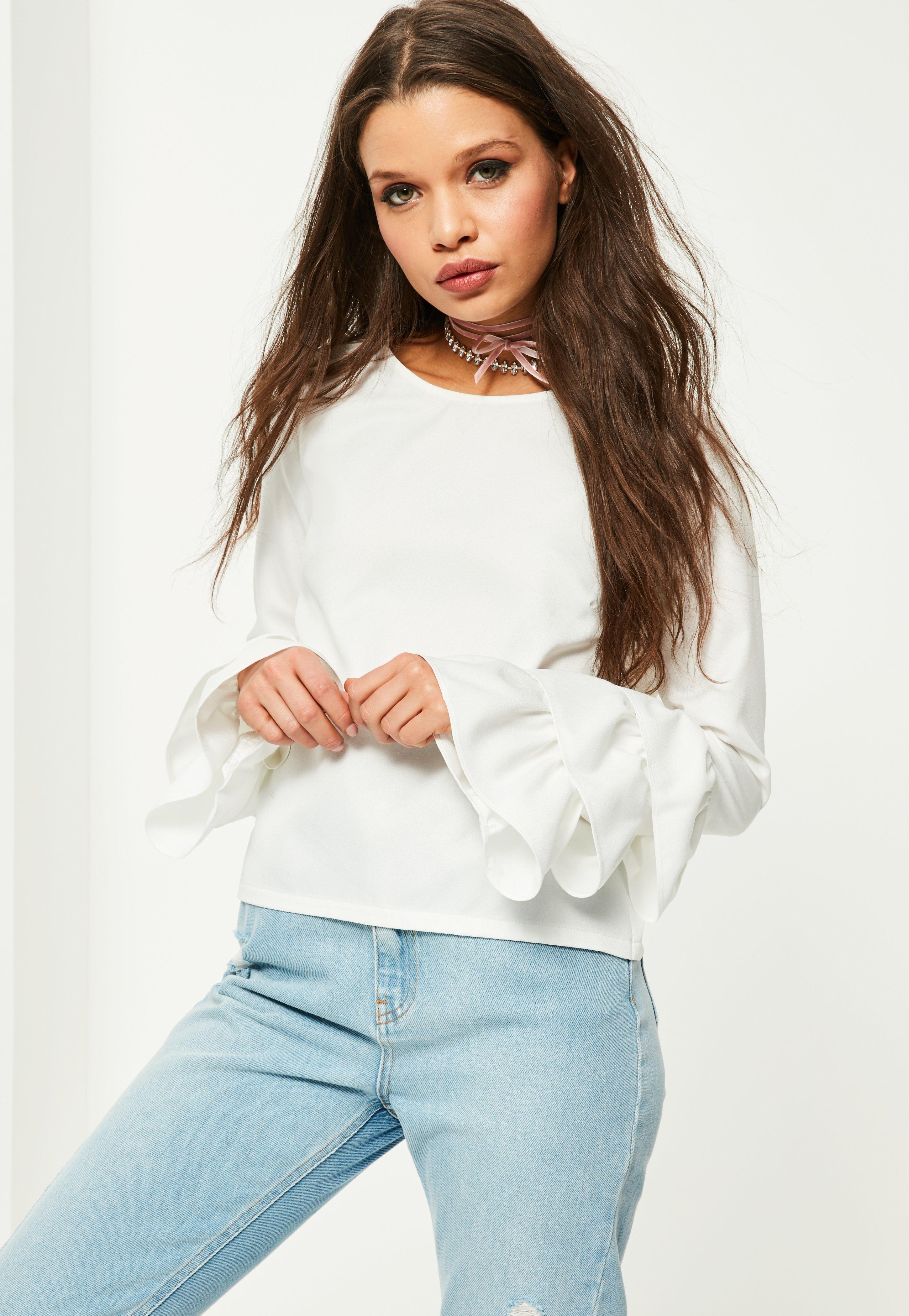 white frill sleeve blouse