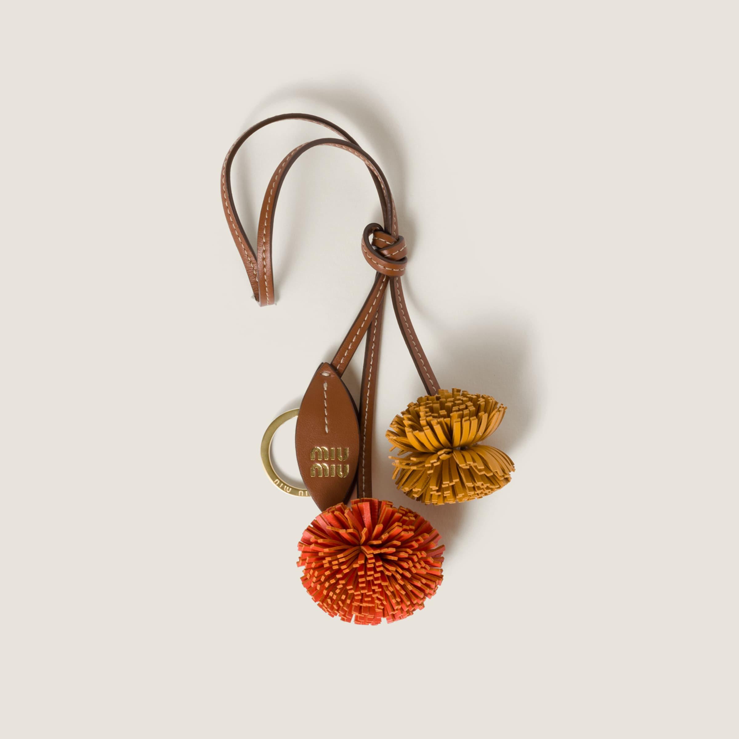 Miu Miu Leather Trick in Natural | Lyst