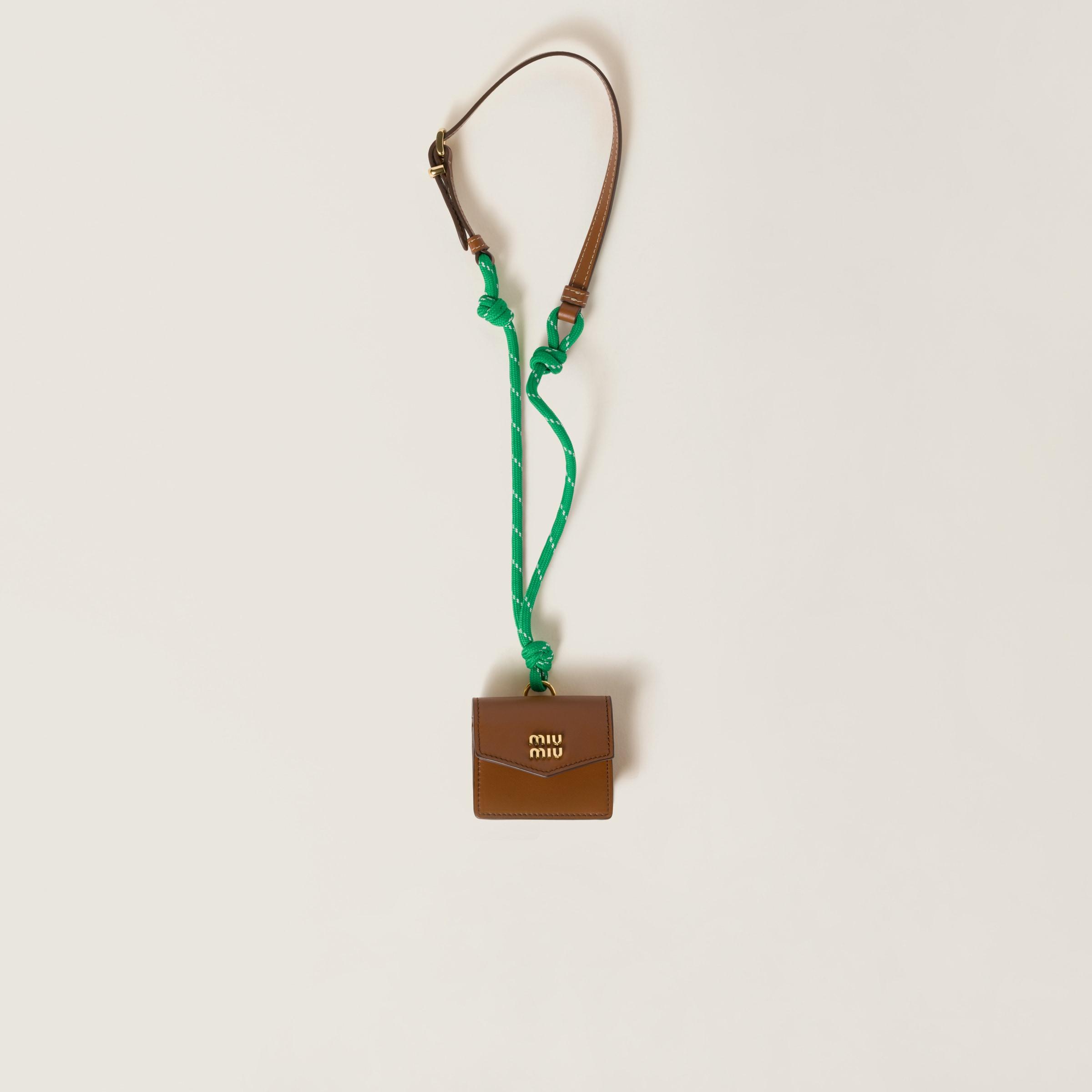 Miu Miu Leather, Cord, And Metal Trick With Mini-Pouch in