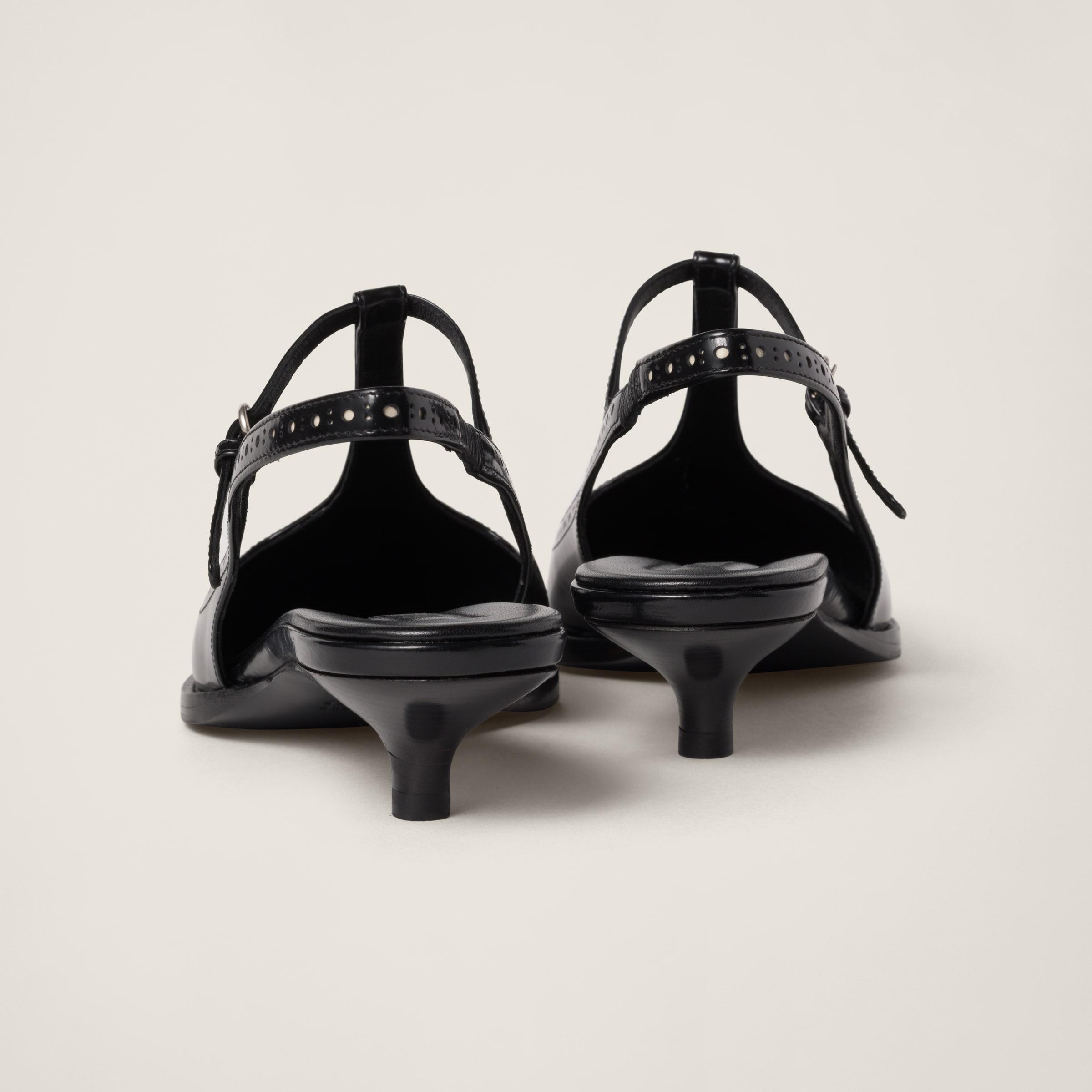 MIU MIU ◆ Brushed Leather Brogue Slingback Miu Miu Brushed Leather Brogue Slingback T-Strap Pumps in