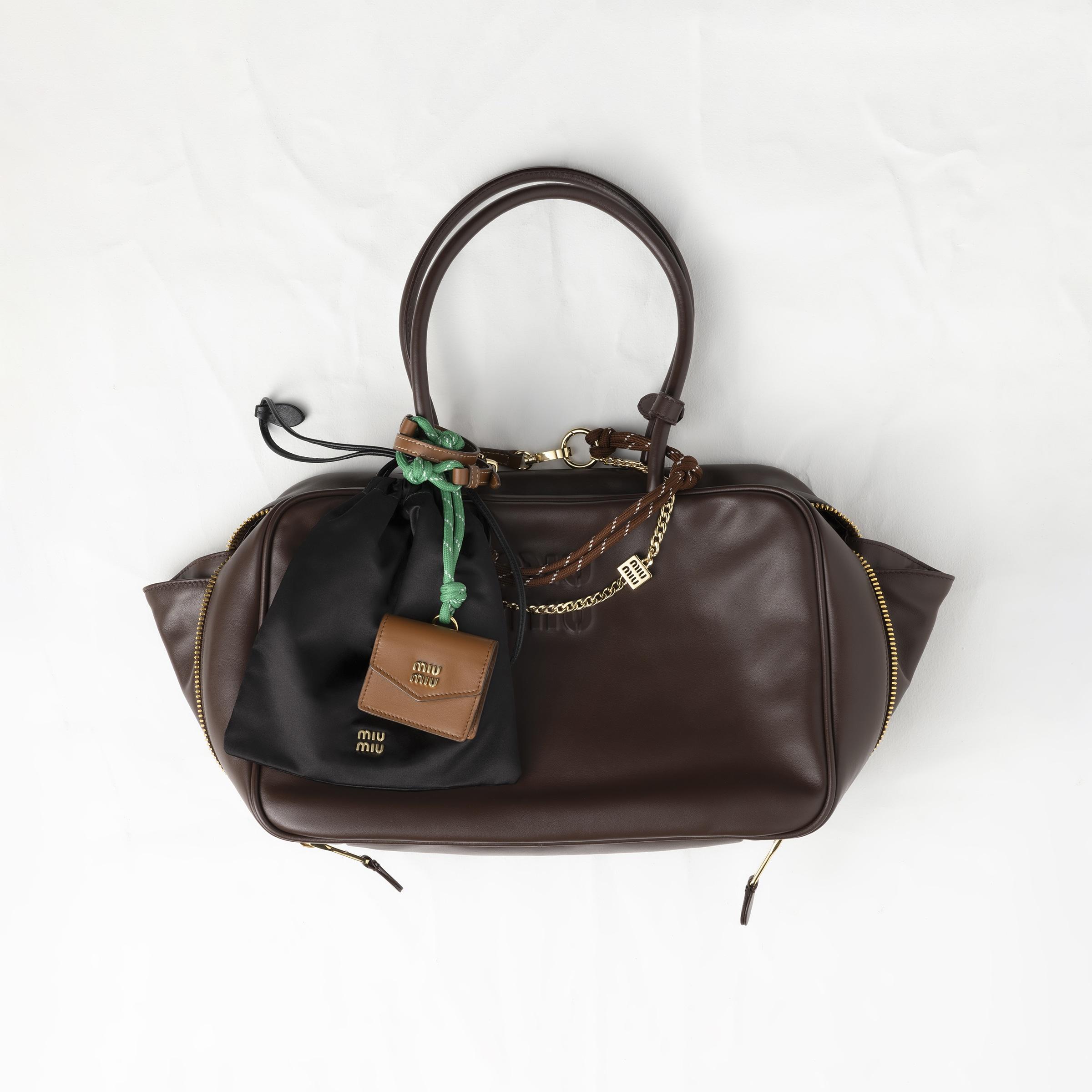 アクセサリーその他 MIU MIU 5TL515_2CRT LEATHER CORD+L TRICK WITH MINI POUCH Miu Miu Mini-pouch leather, cord, and metal trick for Women