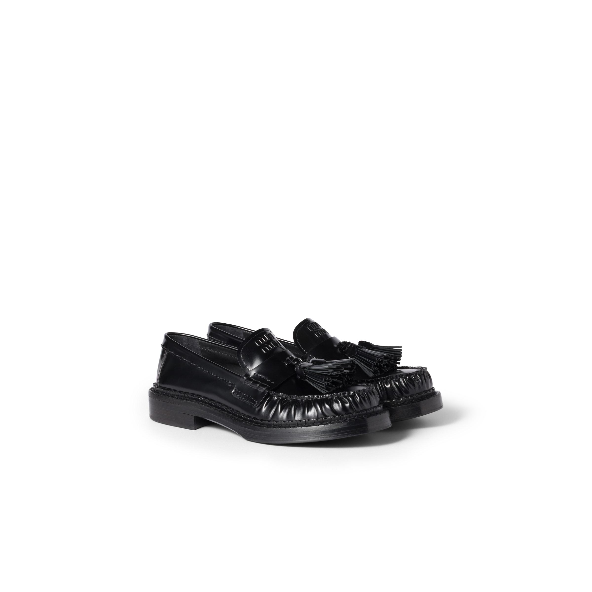 Miu Miu Tassel Loafers in Black | Lyst UK