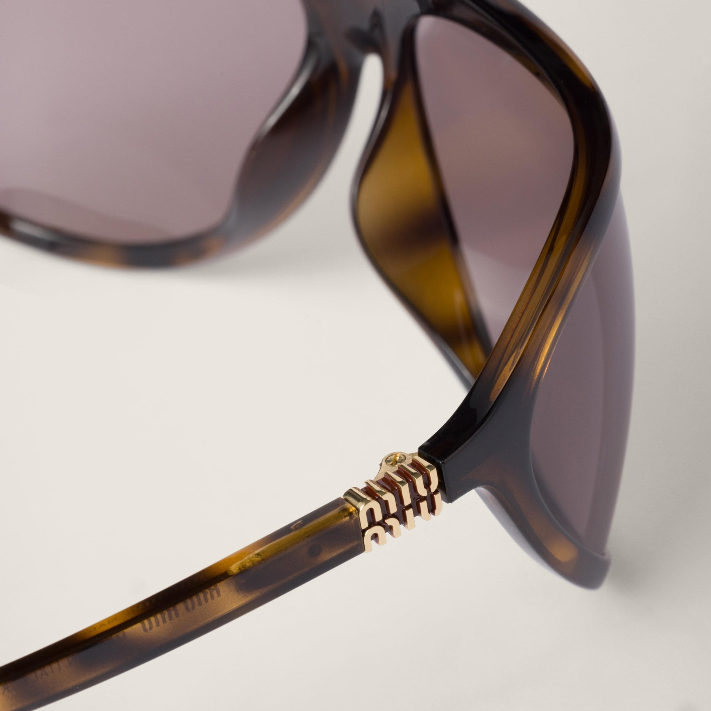 Miu Miu Miu Enigme Sunglasses | Lyst
