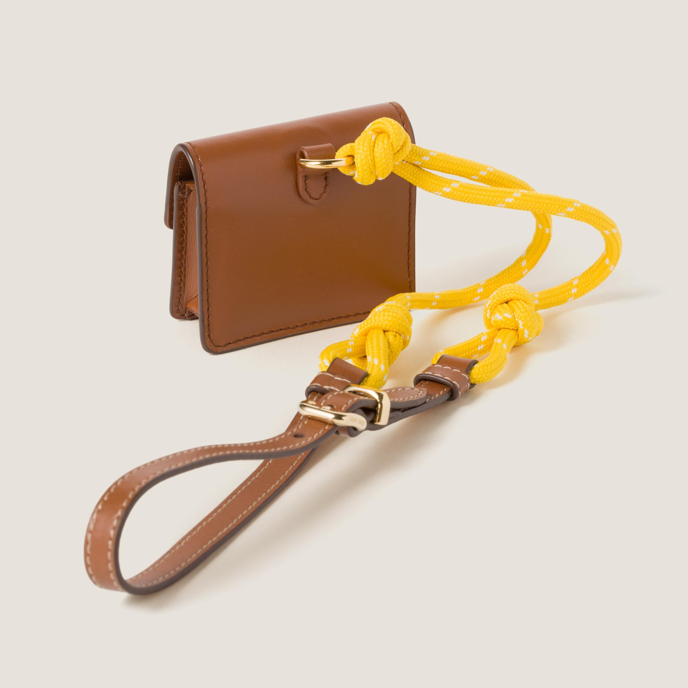 アクセサリーその他 MIU MIU 5TL515_2CRT LEATHER CORD+L TRICK WITH MINI POUCH Miu Miu Leather, Cord, And Metal Trick With Mini-Pouch in