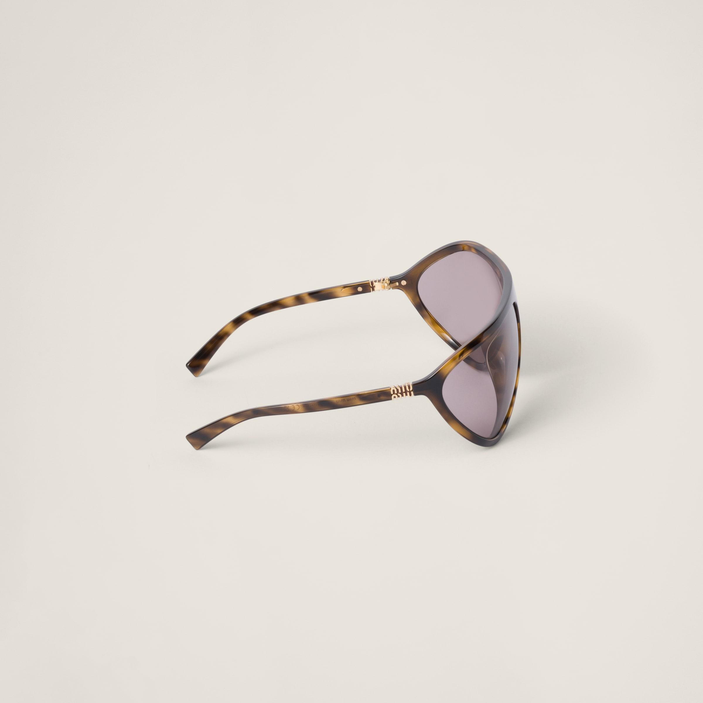Miu Miu Miu Enigme Sunglasses | Lyst