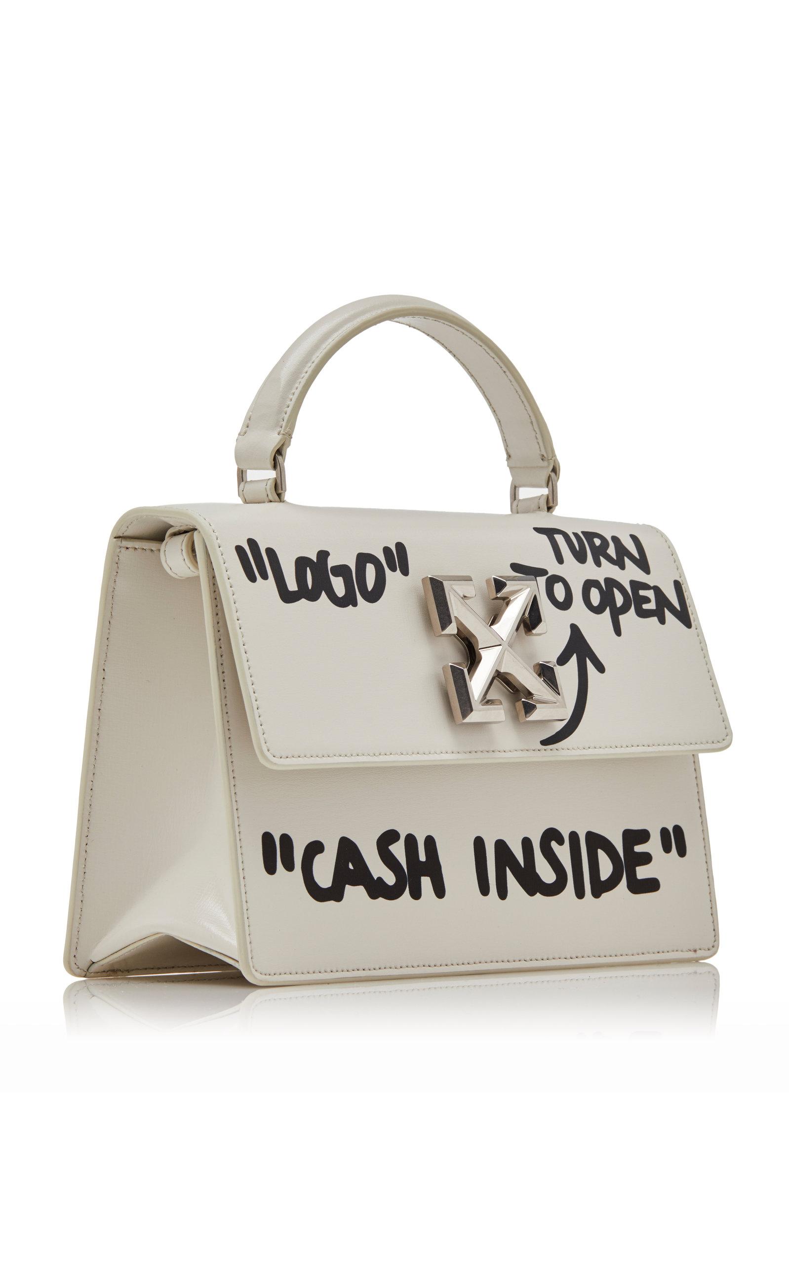 off white cash inside bag