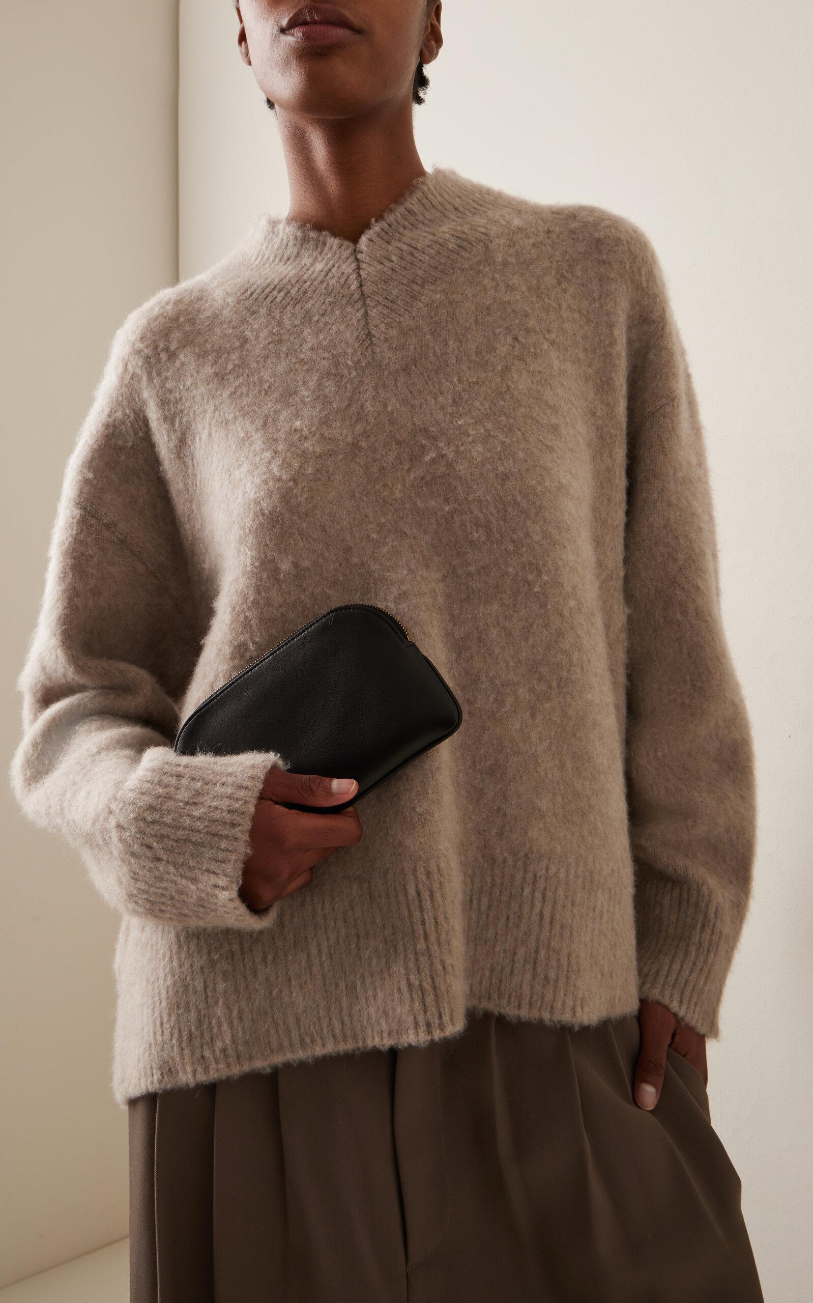 the-row-black-Ew-Circle-Pouch.jpeg