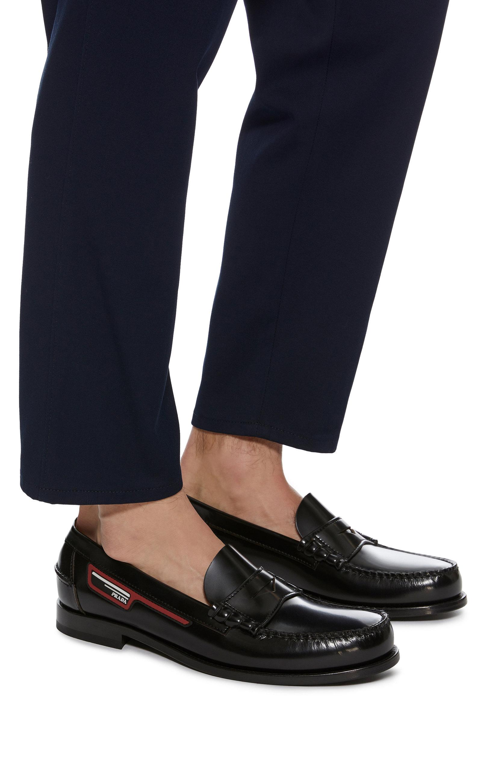 Prada Logo-appliquéd Leather Penny Loafers in Black for Men | Lyst